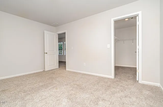a bathroom with a sink vanity and mirror