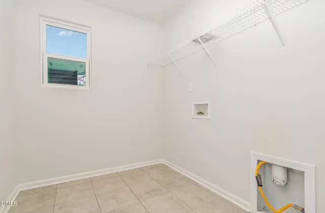 a front view of a house with garage