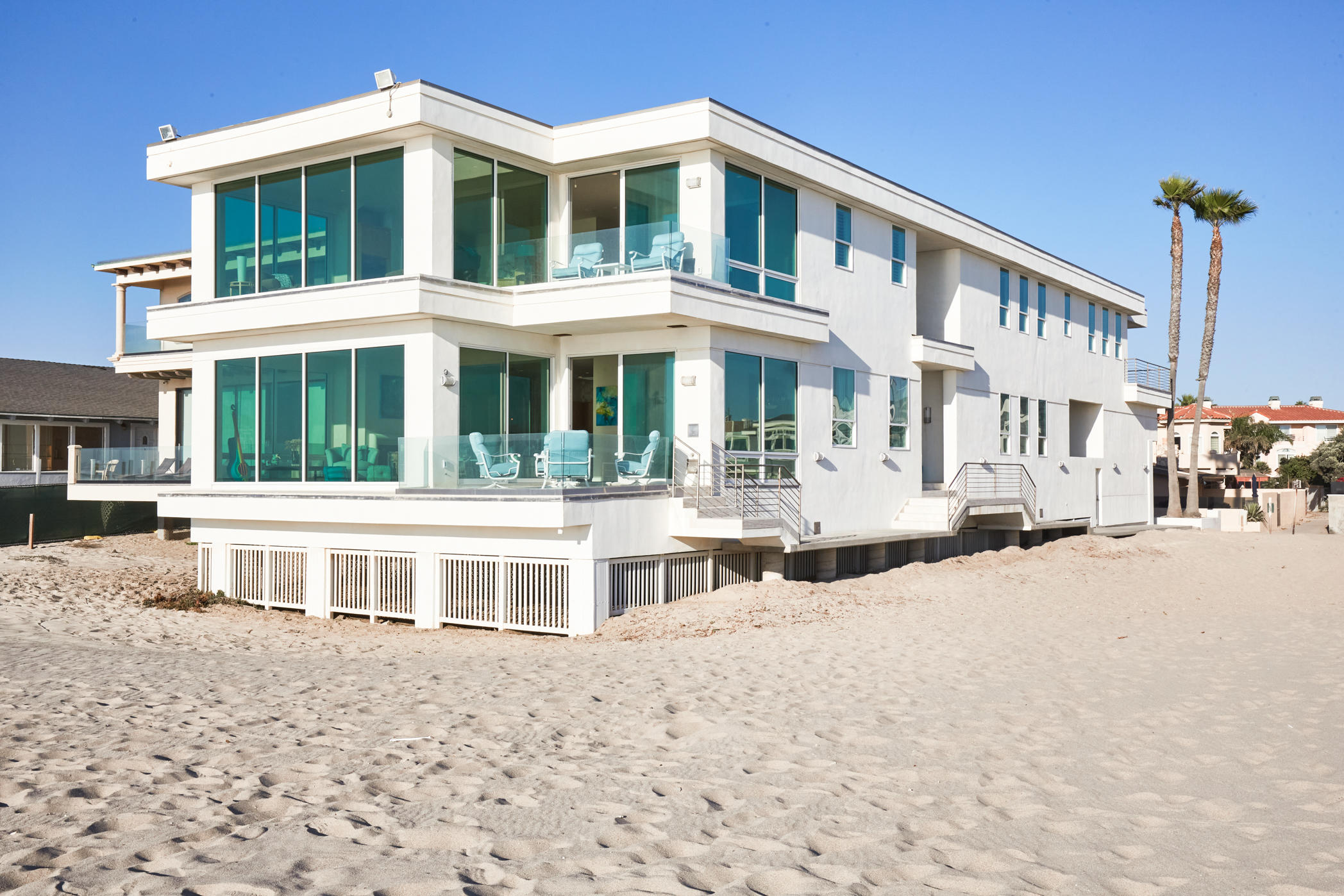 1135 Capri Way Oxnard, CA 93035 - Photo 1 of 50 a view of a large white building with a large windows