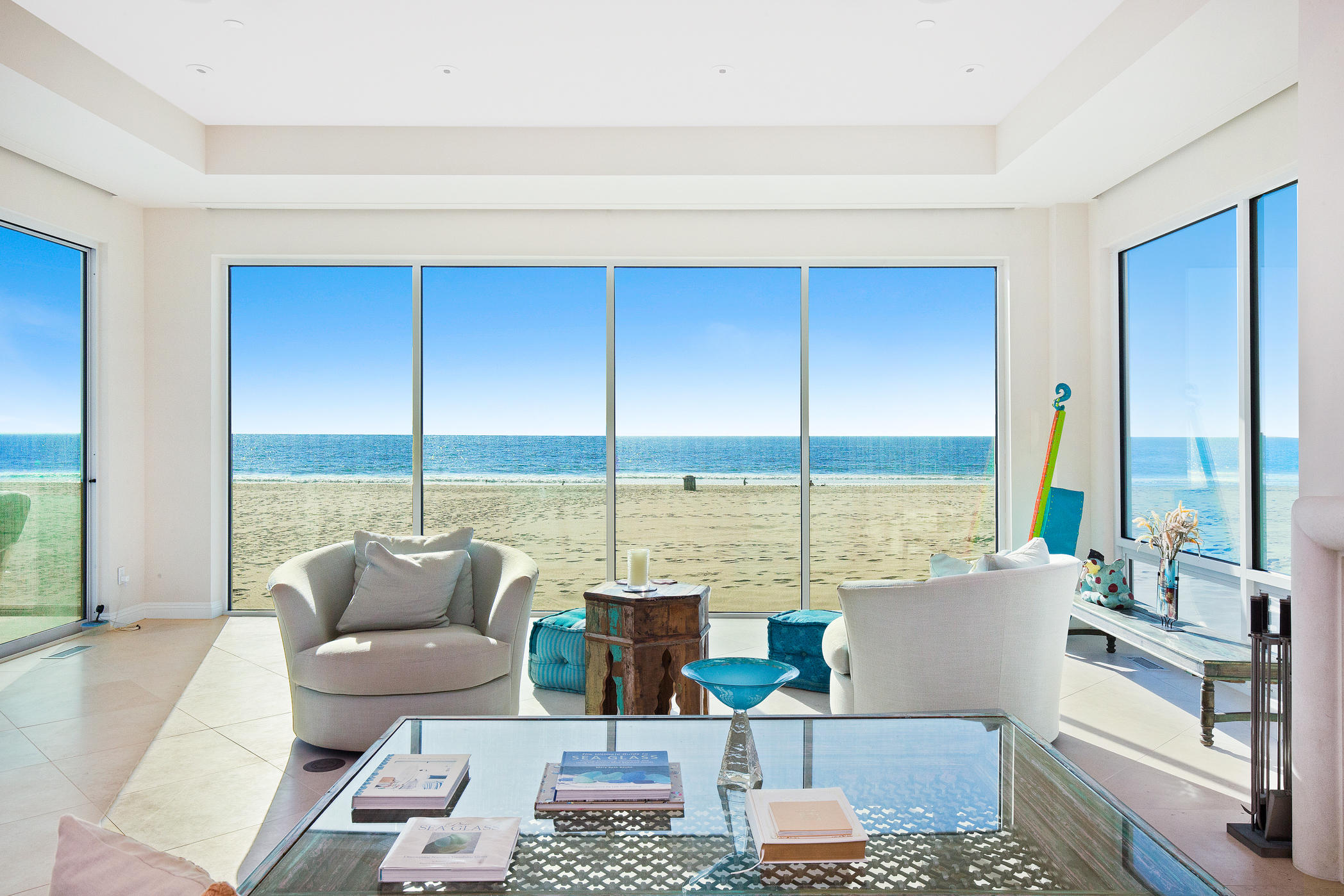 1135 Capri Way Oxnard, CA 93035 - Photo 13 of 50 a living room with furniture and floor to ceiling windows