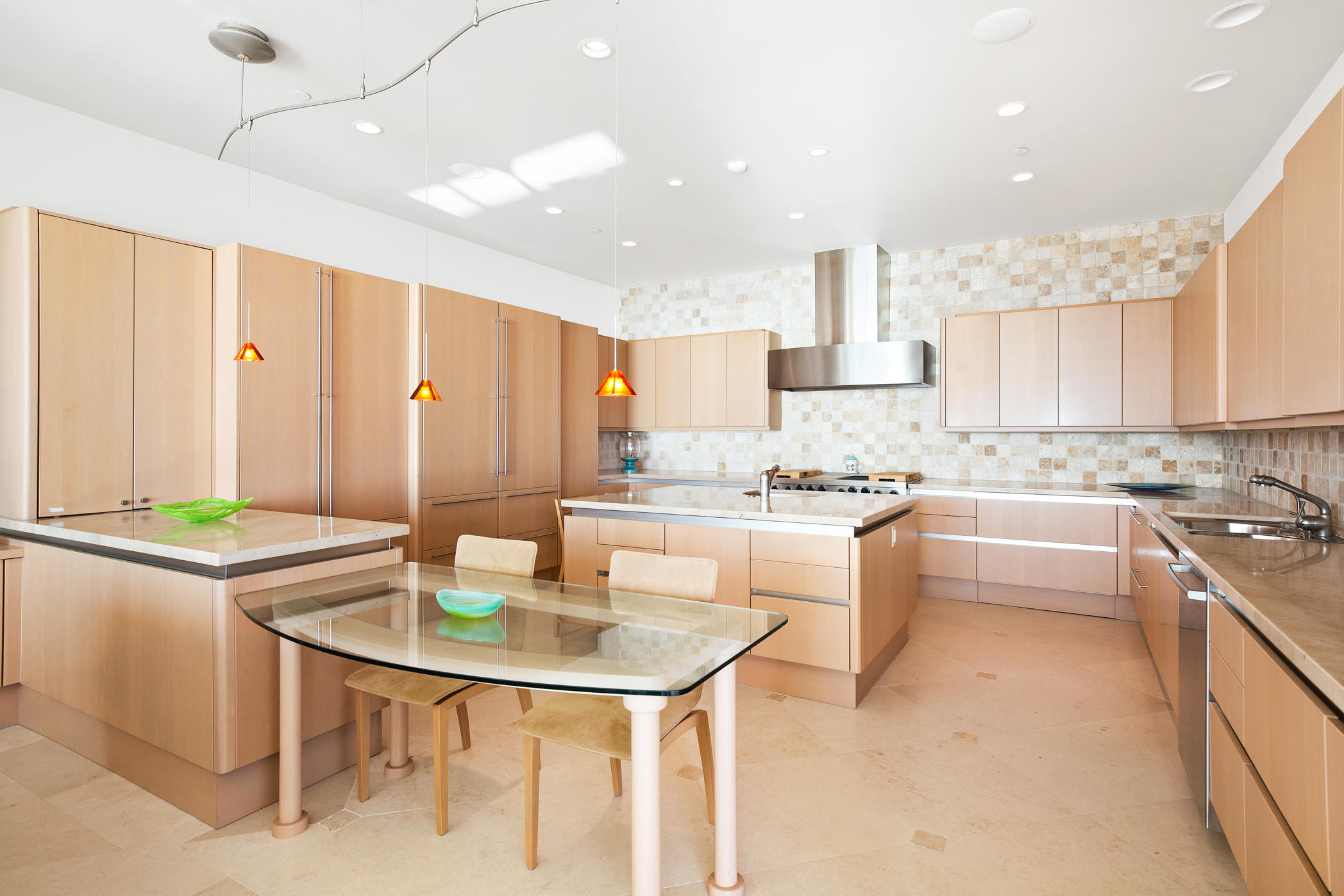 1135 Capri Way Oxnard, CA 93035 - Photo 14 of 50 a kitchen with kitchen island granite countertop a sink and counter space