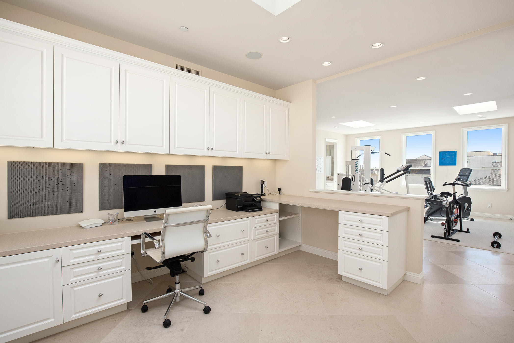 1135 Capri Way Oxnard, CA 93035 - Photo 29 of 50 a kitchen with white cabinets and stainless steel appliances