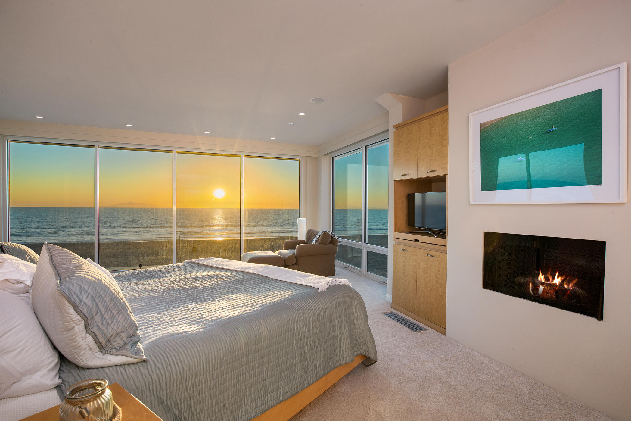 1135 Capri Way Oxnard, CA 93035 - Photo 37 of 50 a bed room with a bed and a fireplace