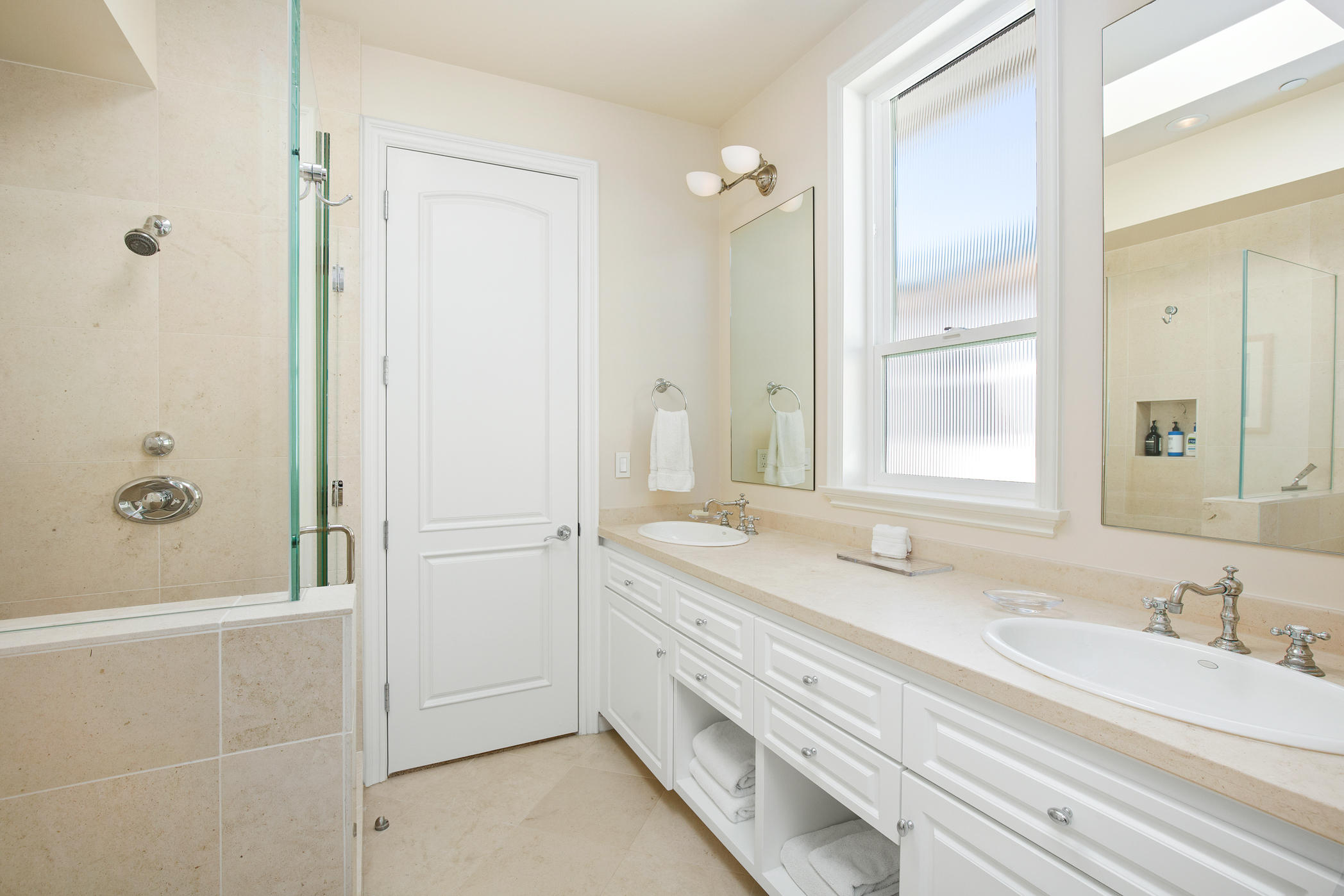 1135 Capri Way Oxnard, CA 93035 - Photo 46 of 50 a bathroom with a granite countertop sink mirror and double