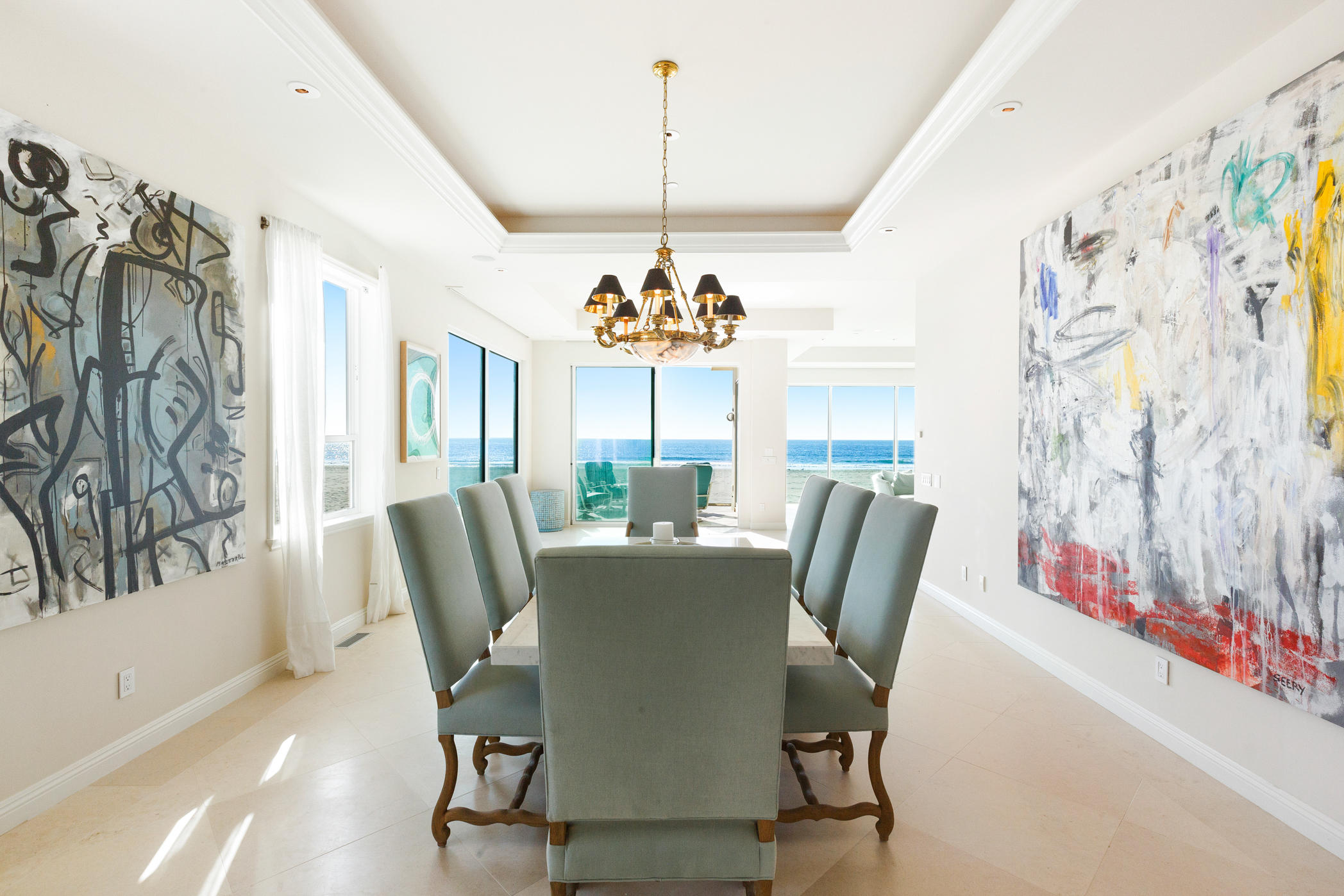 1135 Capri Way Oxnard, CA 93035 - Photo 9 of 50 a dining room with furniture a chandelier and wooden floor