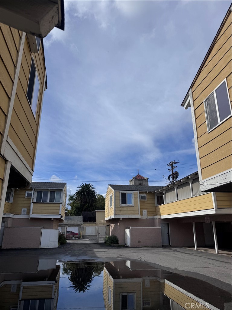 720 North Lacy Street, Unit E Santa Ana, CA 92701 - Photo 6 of 7 a view of houses with sky view