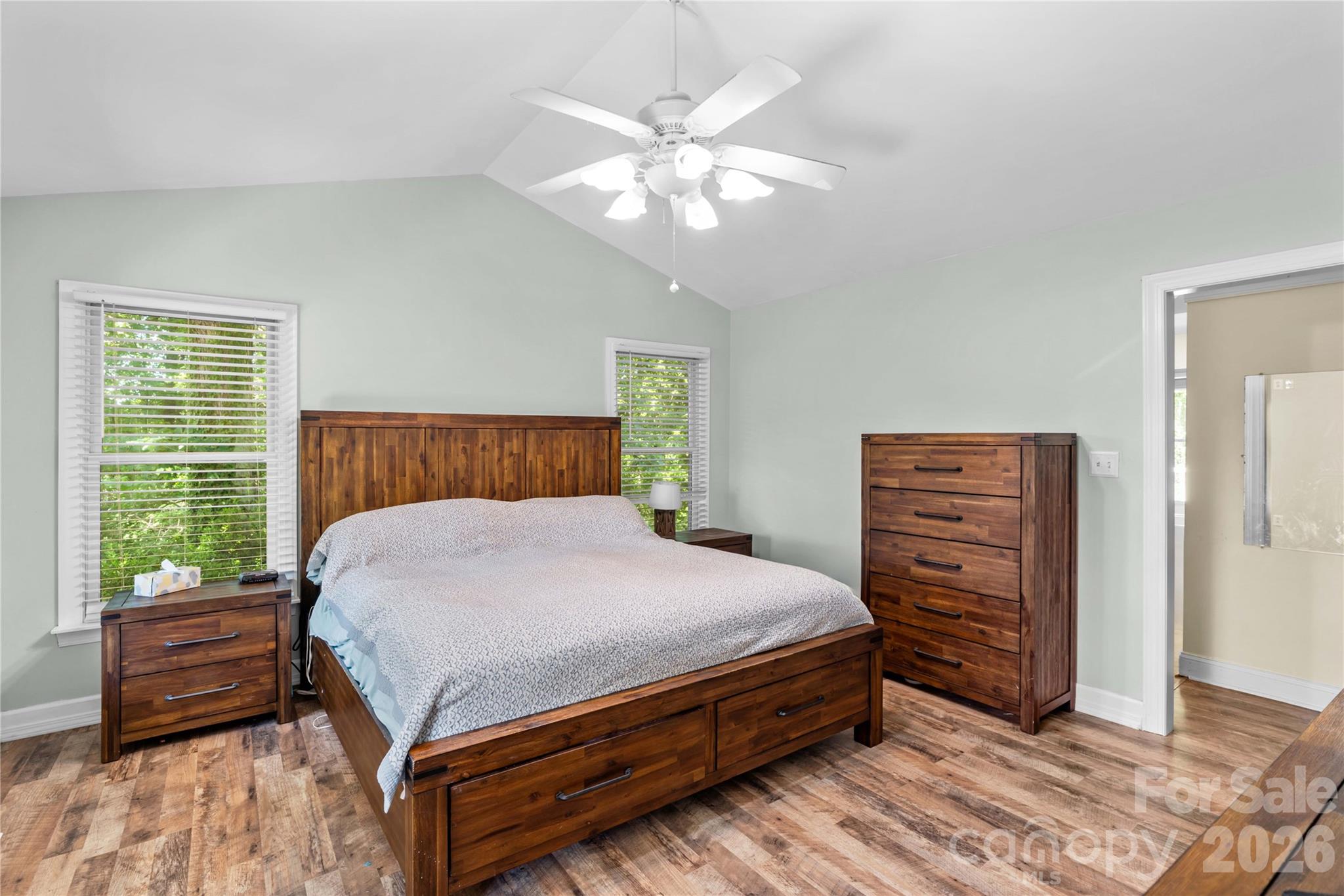 711 Spring Pointe Drive Stony Point, NC 28678 - Photo 19 of 47 a bedroom with a bed dresser and a window