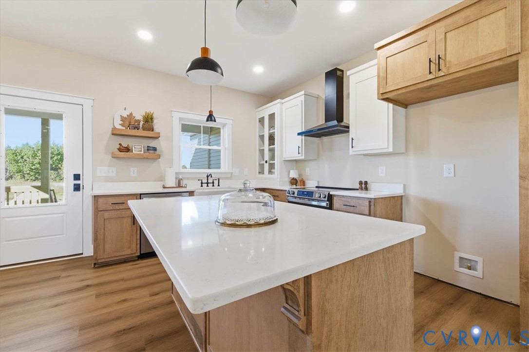 1602 Lansing Road Petersburg, VA 23805 - Photo 11 of 30 a kitchen with stainless steel appliances granite countertop a sink a stove and a wooden floors