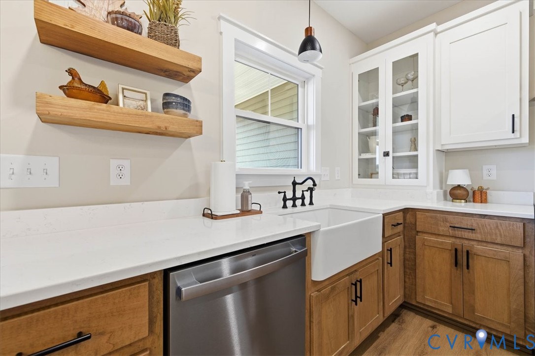 1602 Lansing Road Petersburg, VA 23805 - Photo 13 of 30 a kitchen with a sink dishwasher window and cabinets