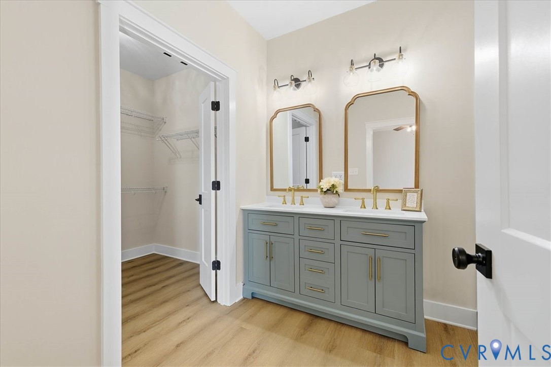 1602 Lansing Road Petersburg, VA 23805 - Photo 18 of 30 a spacious bathroom with a granite countertop sink a mirror and shower