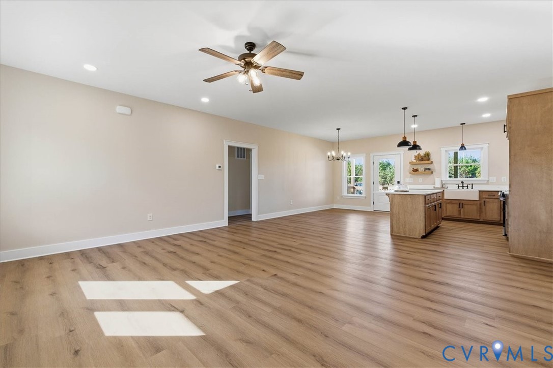 1602 Lansing Road Petersburg, VA 23805 - Photo 6 of 30 a living room with stainless steel appliances furniture and wooden floor