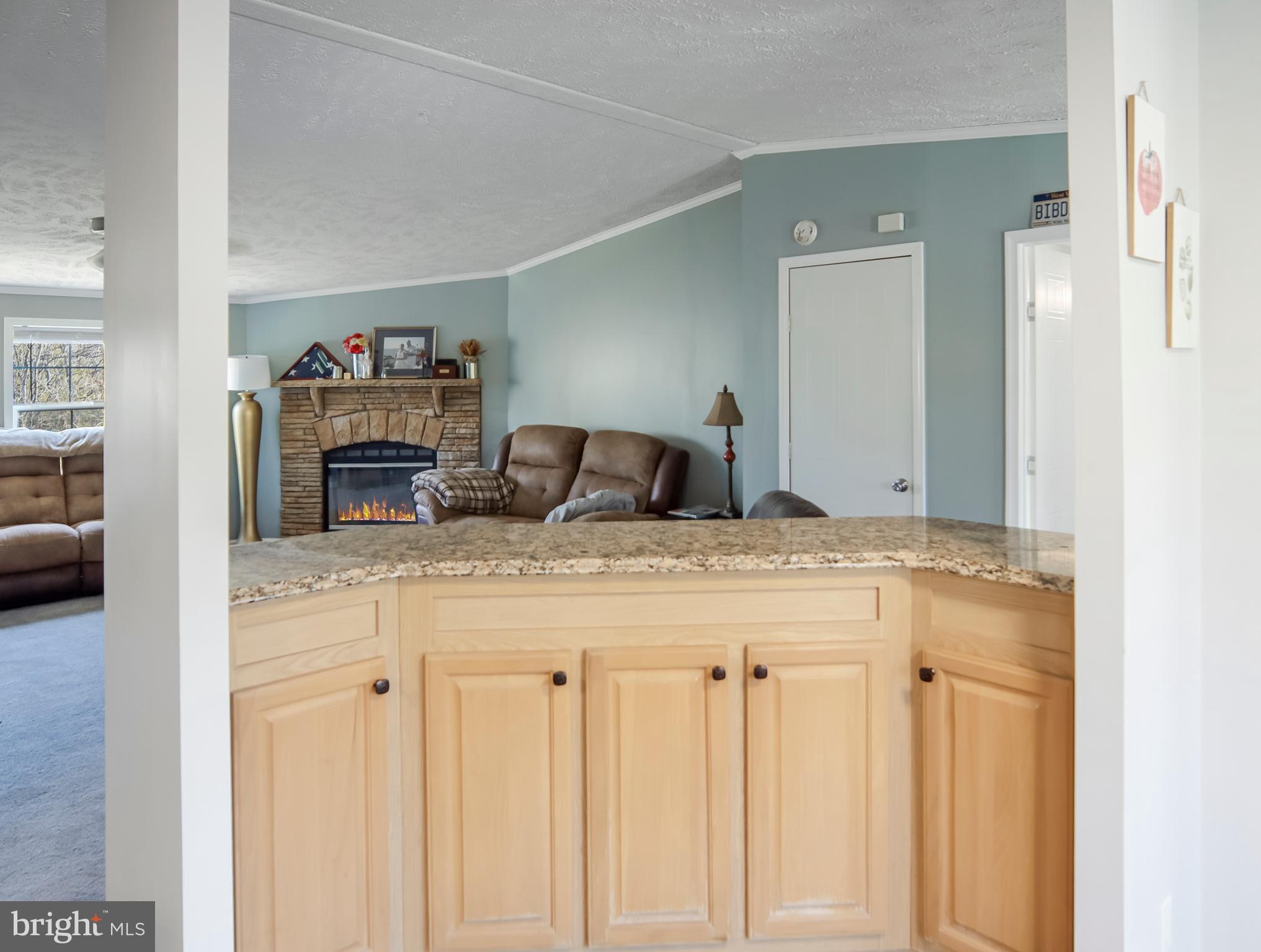 108 Rebel Drive Falling Waters, WV 25419 - Photo 16 of 27 a en suite bathroom with a granite countertop sink