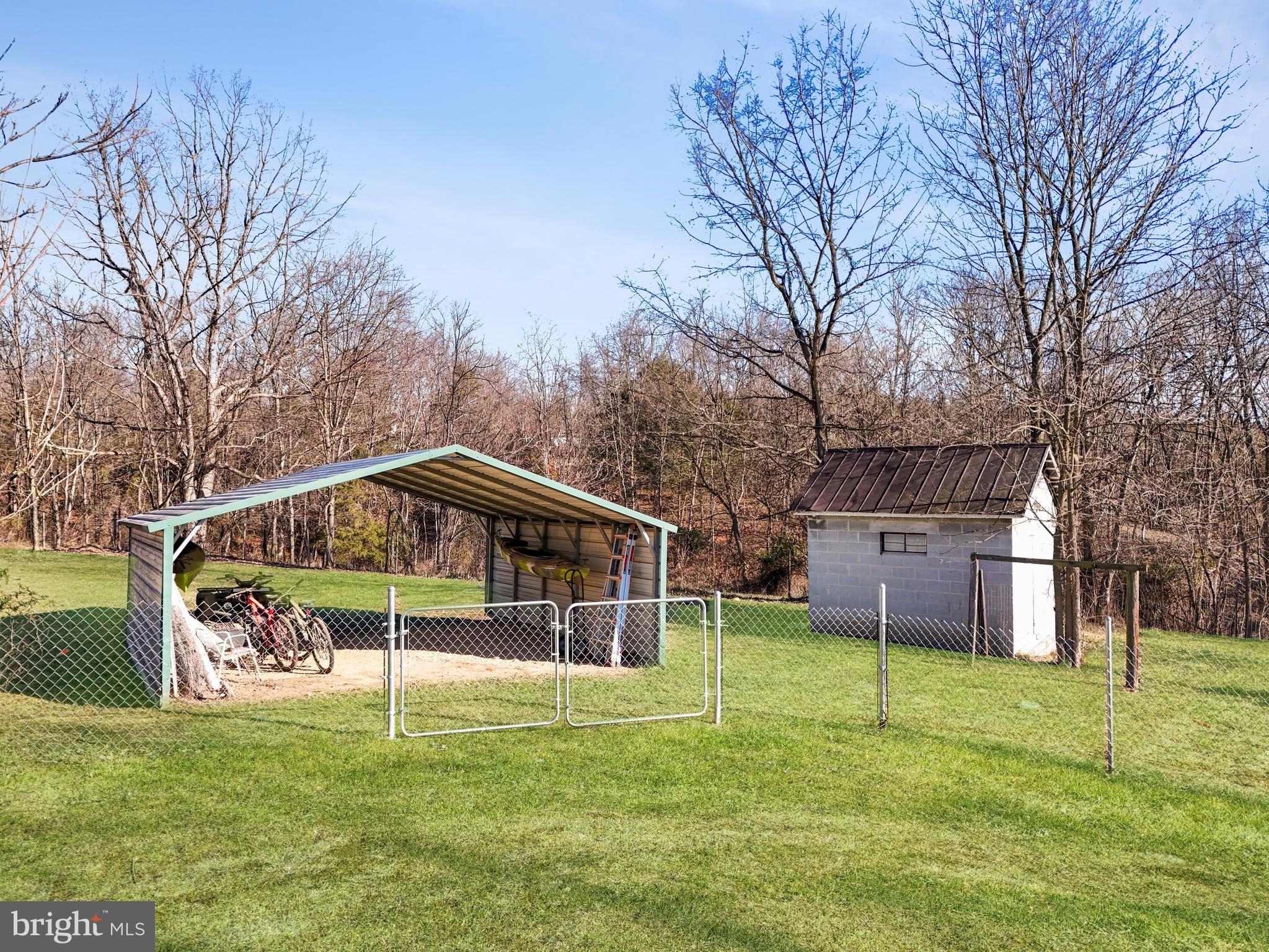 108 Rebel Drive Falling Waters, WV 25419 - Photo 4 of 27 a view of a house with backyard and trees