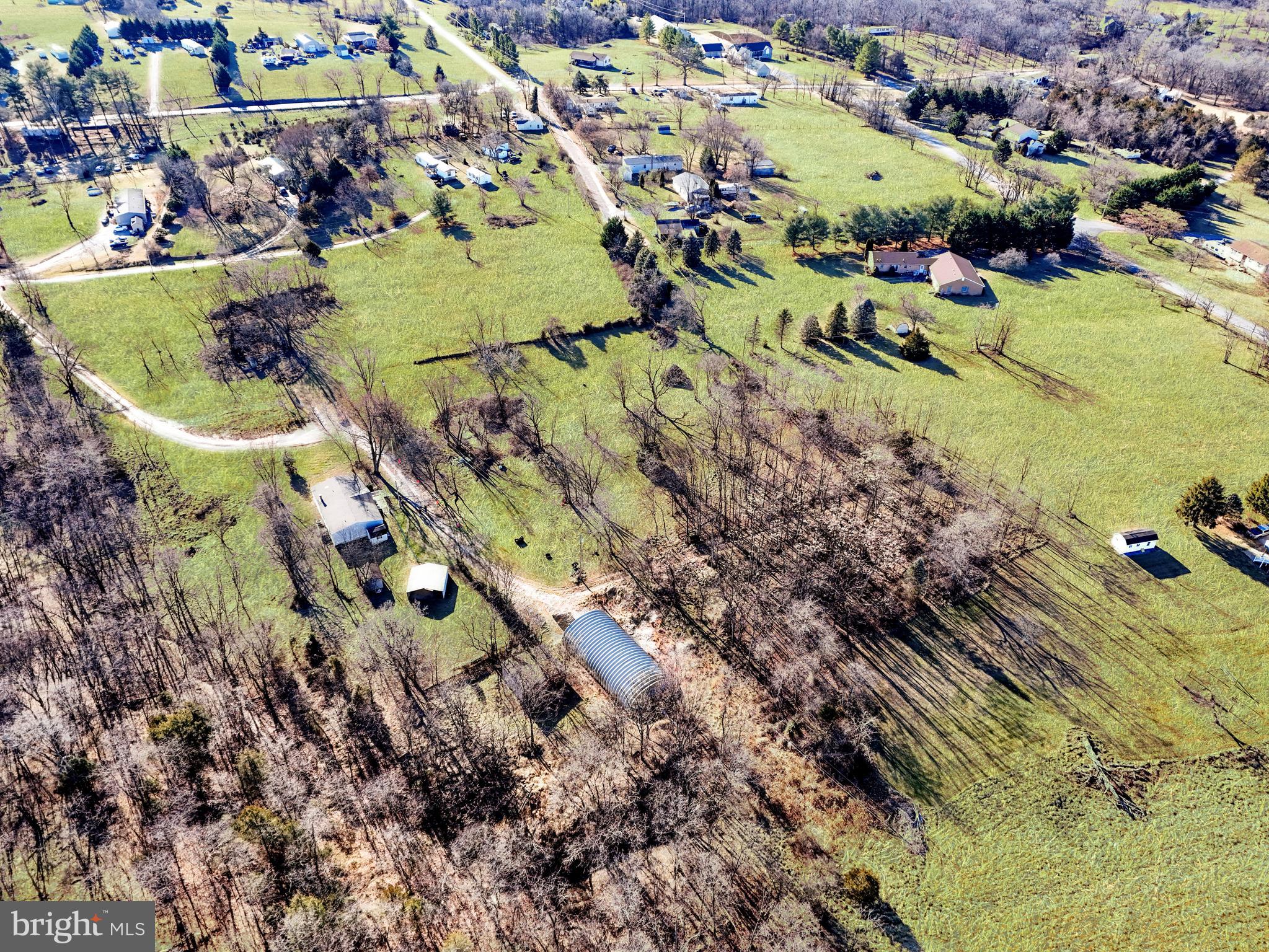 108 Rebel Drive Falling Waters, WV 25419 - Photo 8 of 27 an aerial view of swimming pool a yard and mountain view in back