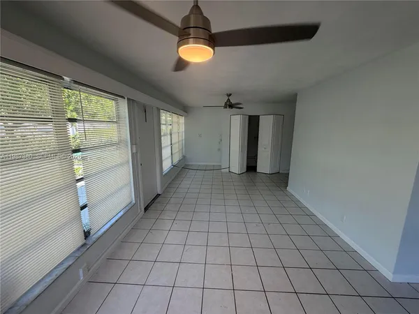 a view of an empty room and window