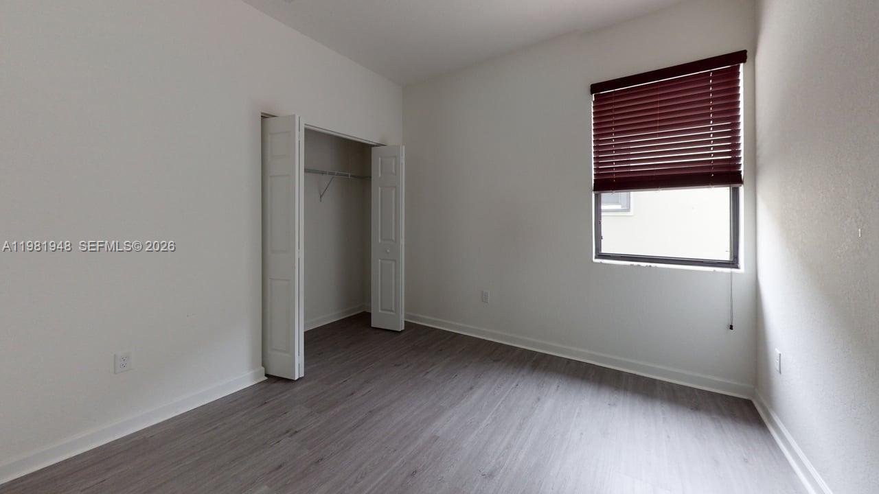 11035 West 35th Way, Unit 11035 Hialeah, FL 33018 - Photo 5 of 16 First Floor Bedroom 2