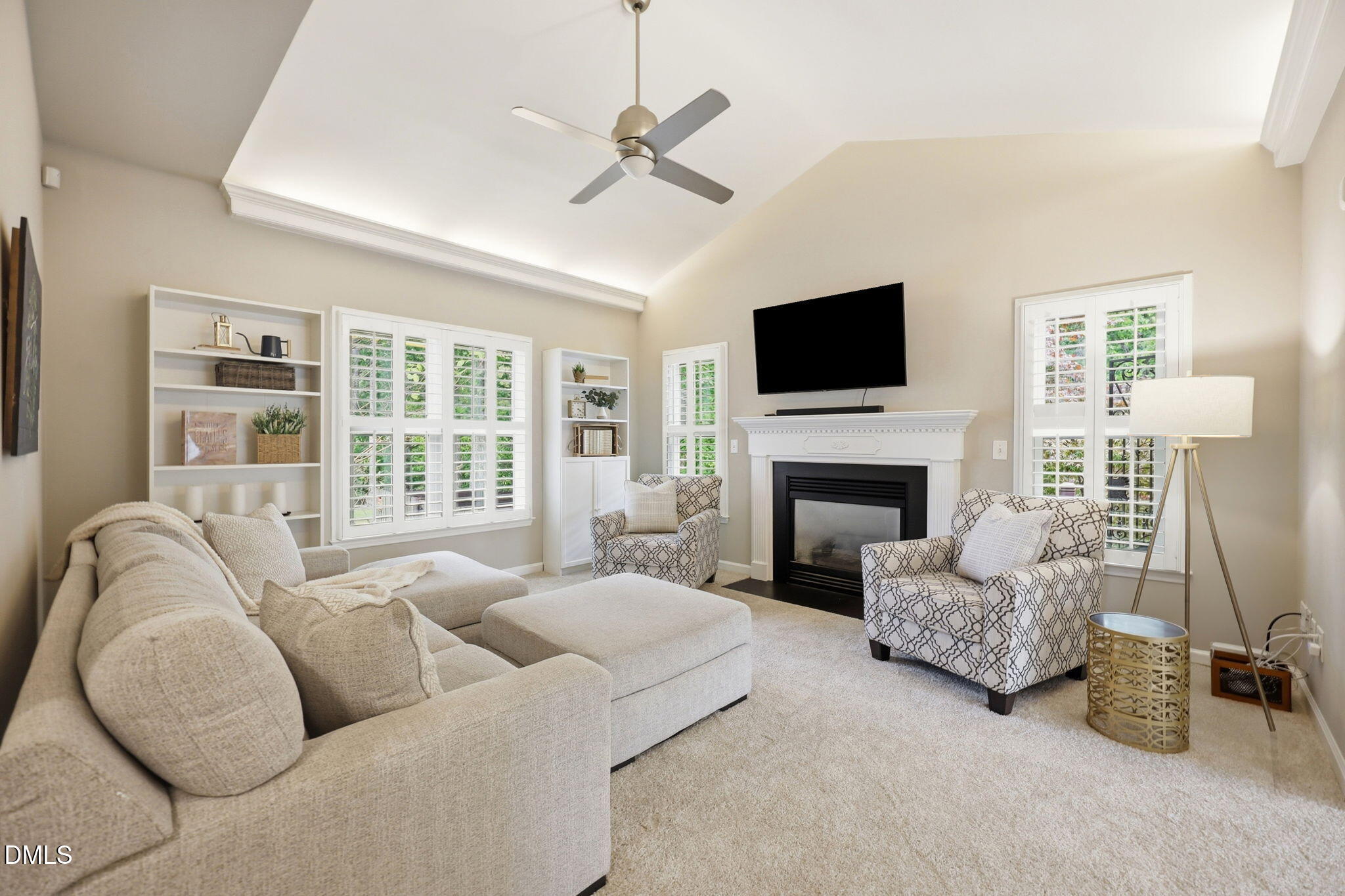 1716 Farmington Grove Drive Raleigh, NC 27614 - Photo 14 of 41 a living room with furniture fireplace and flat screen tv