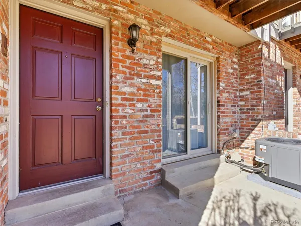 a view of front door of house with couch