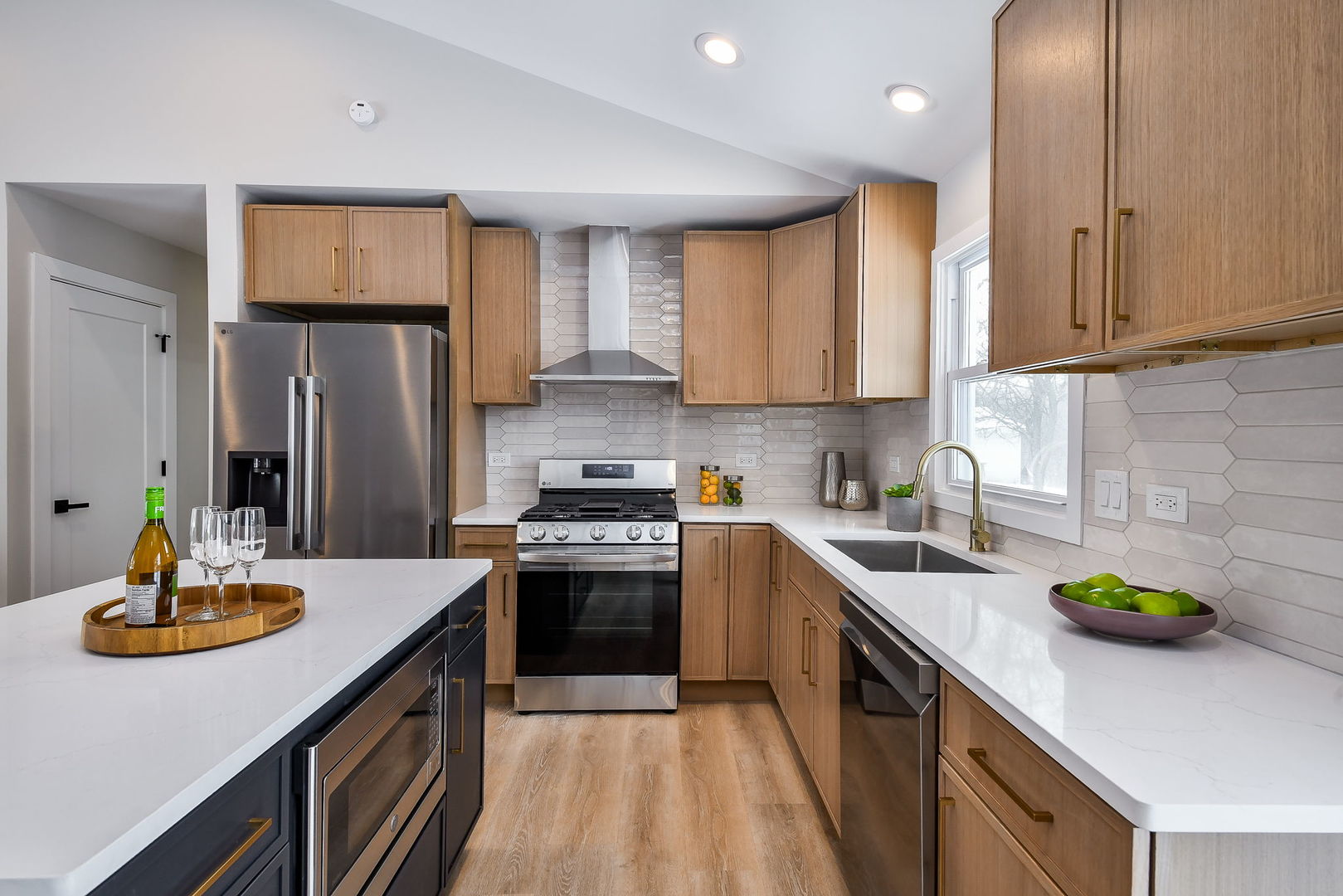 5740 Ridgewood Drive Western Springs, IL 60558 - Photo 13 of 25 a kitchen with stainless steel appliances a sink a stove and refrigerator