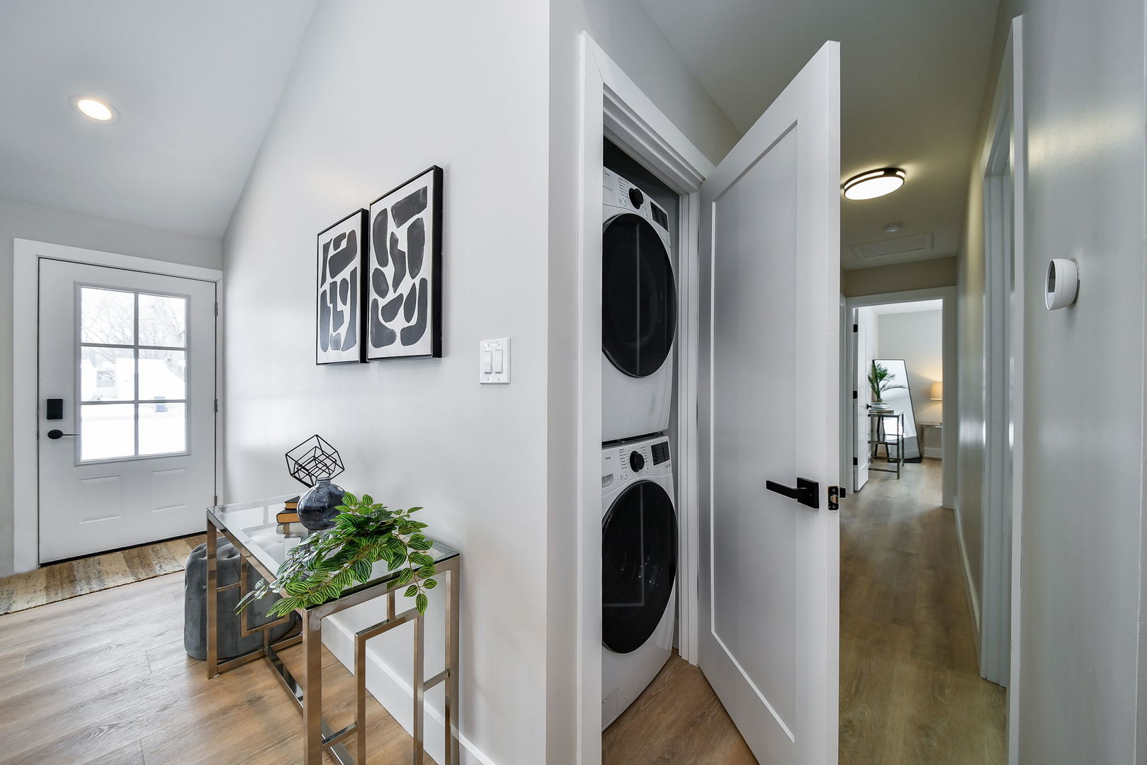 5740 Ridgewood Drive Western Springs, IL 60558 - Photo 15 of 25 a view of a hallway with washer and dryer
