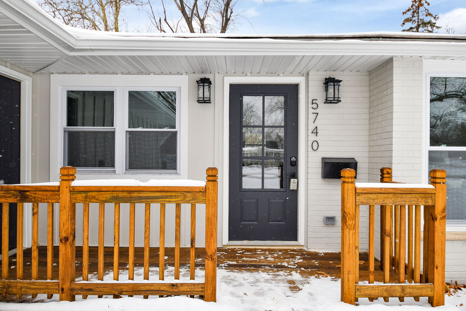 5740 Ridgewood Drive Western Springs, IL 60558 - Photo 2 of 25 a front view of a house with a fence
