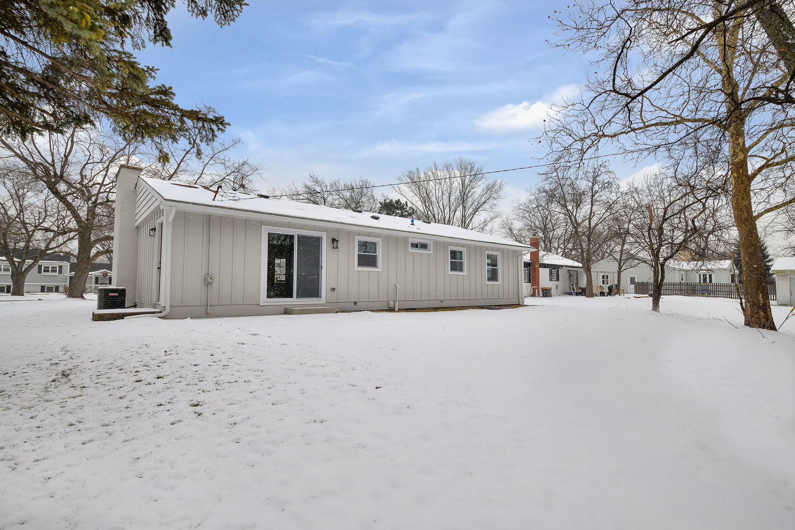5740 Ridgewood Drive Western Springs, IL 60558 - Photo 25 of 25 a front view of house with a yard and parking