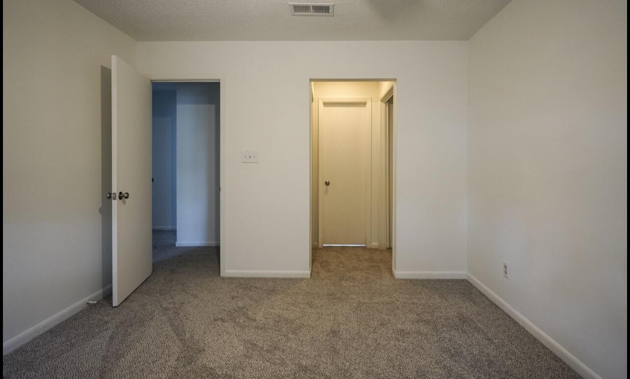 5 Pine Ridge Trace Destin, FL 32541 - Photo 11 of 22 an empty room with closet and a bathroom