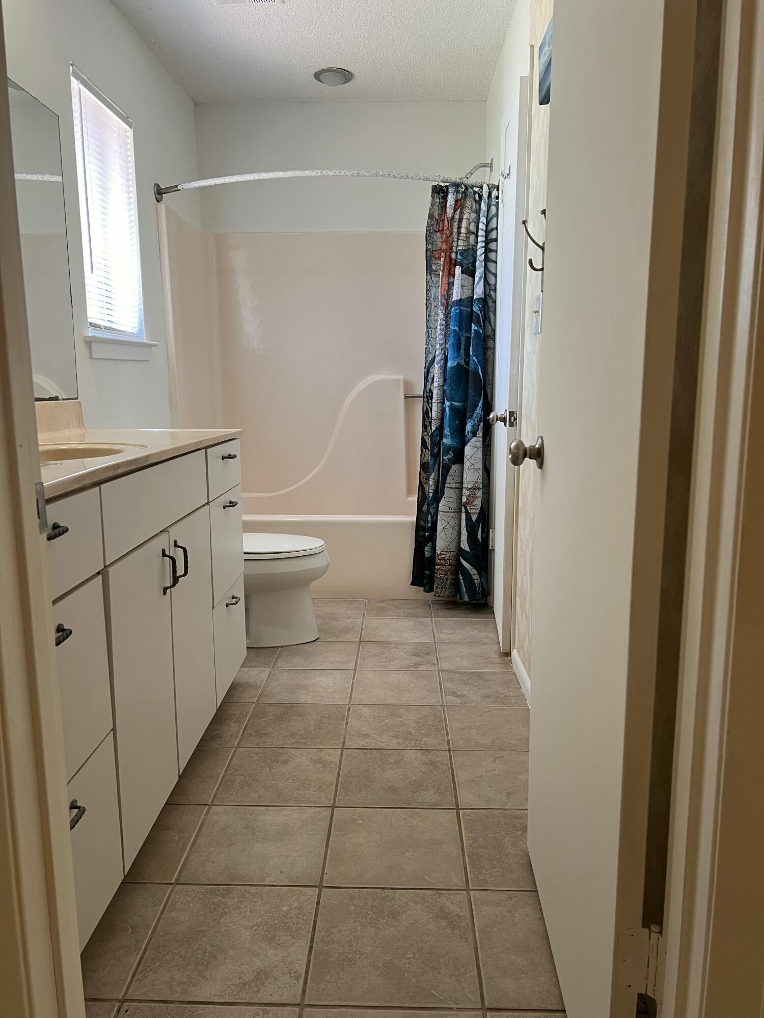 5 Pine Ridge Trace Destin, FL 32541 - Photo 15 of 22 a bathroom with a toilet and a shower