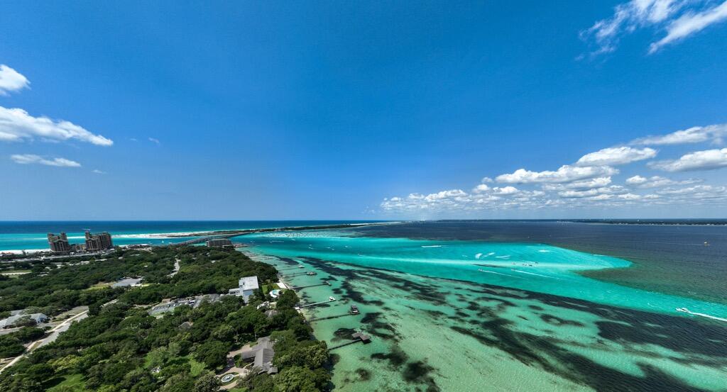 5 Pine Ridge Trace Destin, FL 32541 - Photo 18 of 22 a view of a golf course with a lake