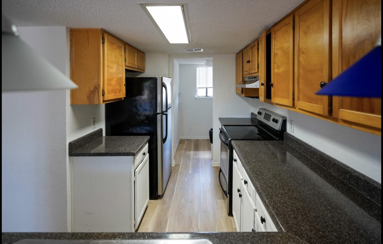 5 Pine Ridge Trace Destin, FL 32541 - Photo 5 of 22 a kitchen with stainless steel appliances granite countertop a refrigerator a stove and a sink