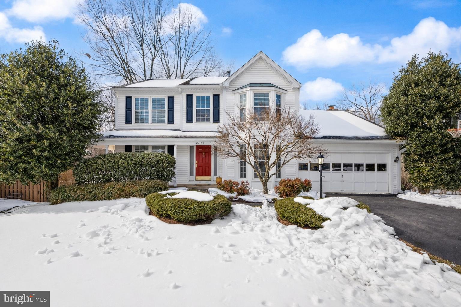 8144 Tall Timber Drive Gainesville, VA 20155 - Photo 1 of 73 a front view of a house with a yard