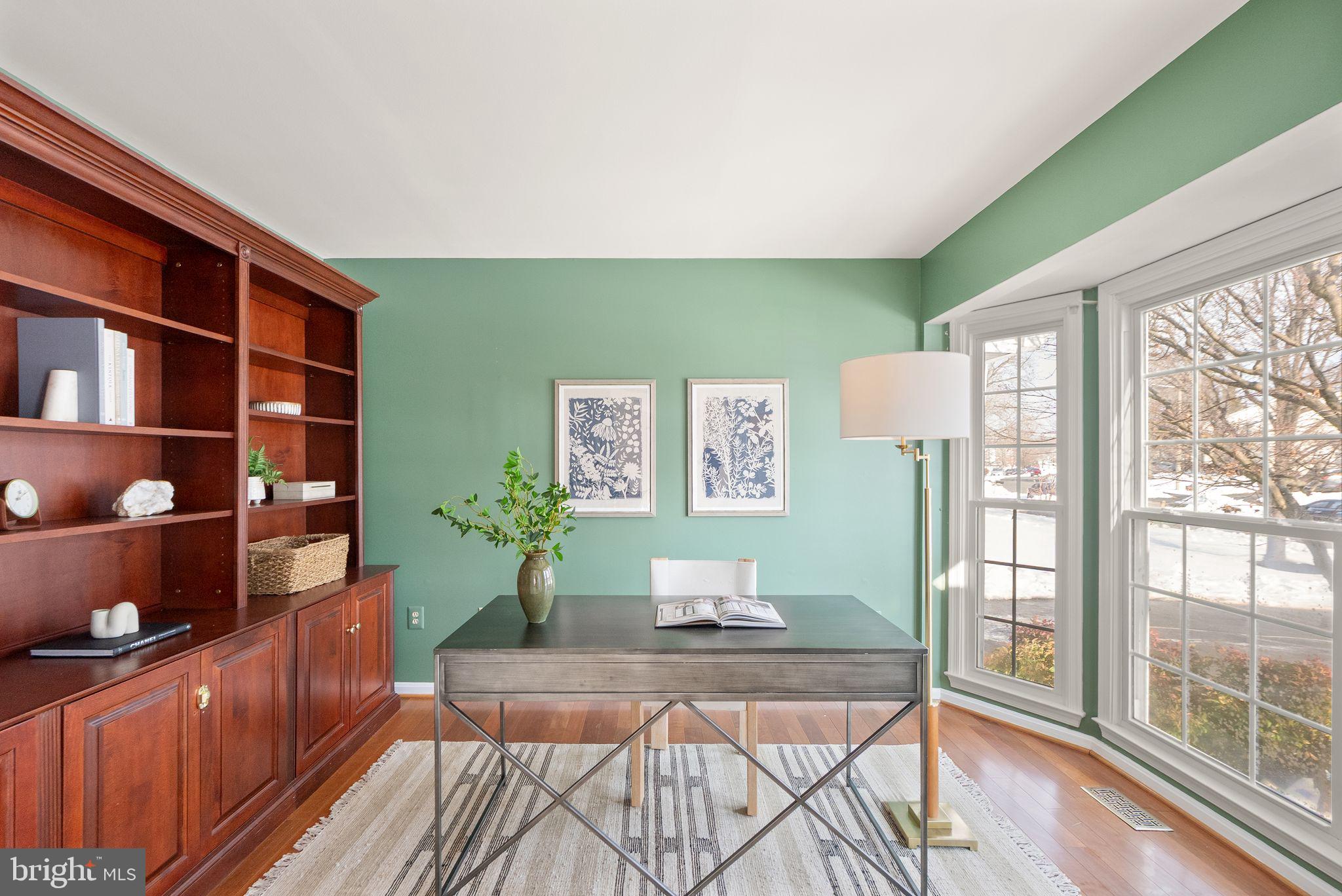 8144 Tall Timber Drive Gainesville, VA 20155 - Photo 12 of 73 a living room with furniture large window and wooden floor