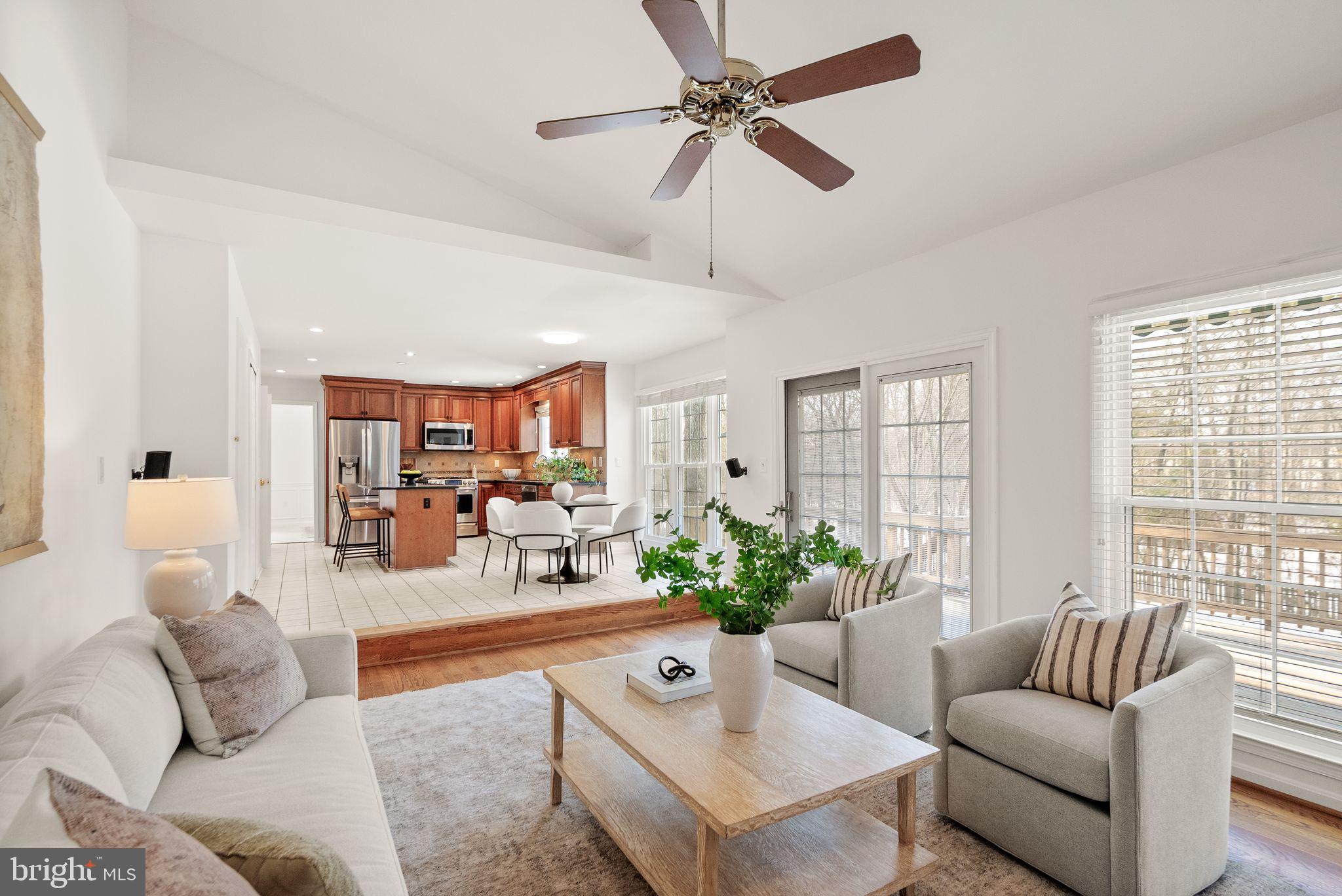 8144 Tall Timber Drive Gainesville, VA 20155 - Photo 27 of 73 a living room with furniture and a large window
