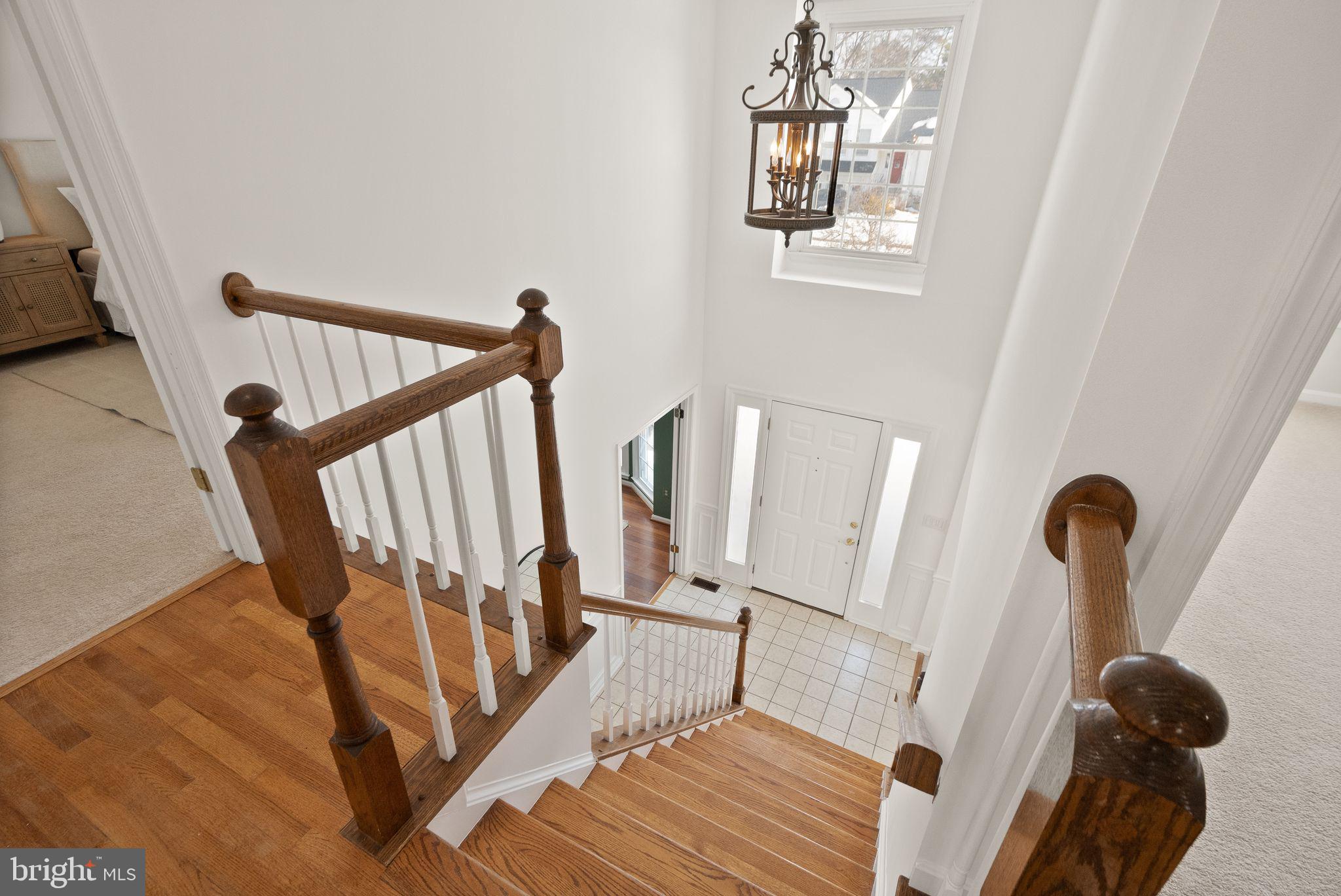 8144 Tall Timber Drive Gainesville, VA 20155 - Photo 30 of 73 a view of entryway with furniture and wooden floor