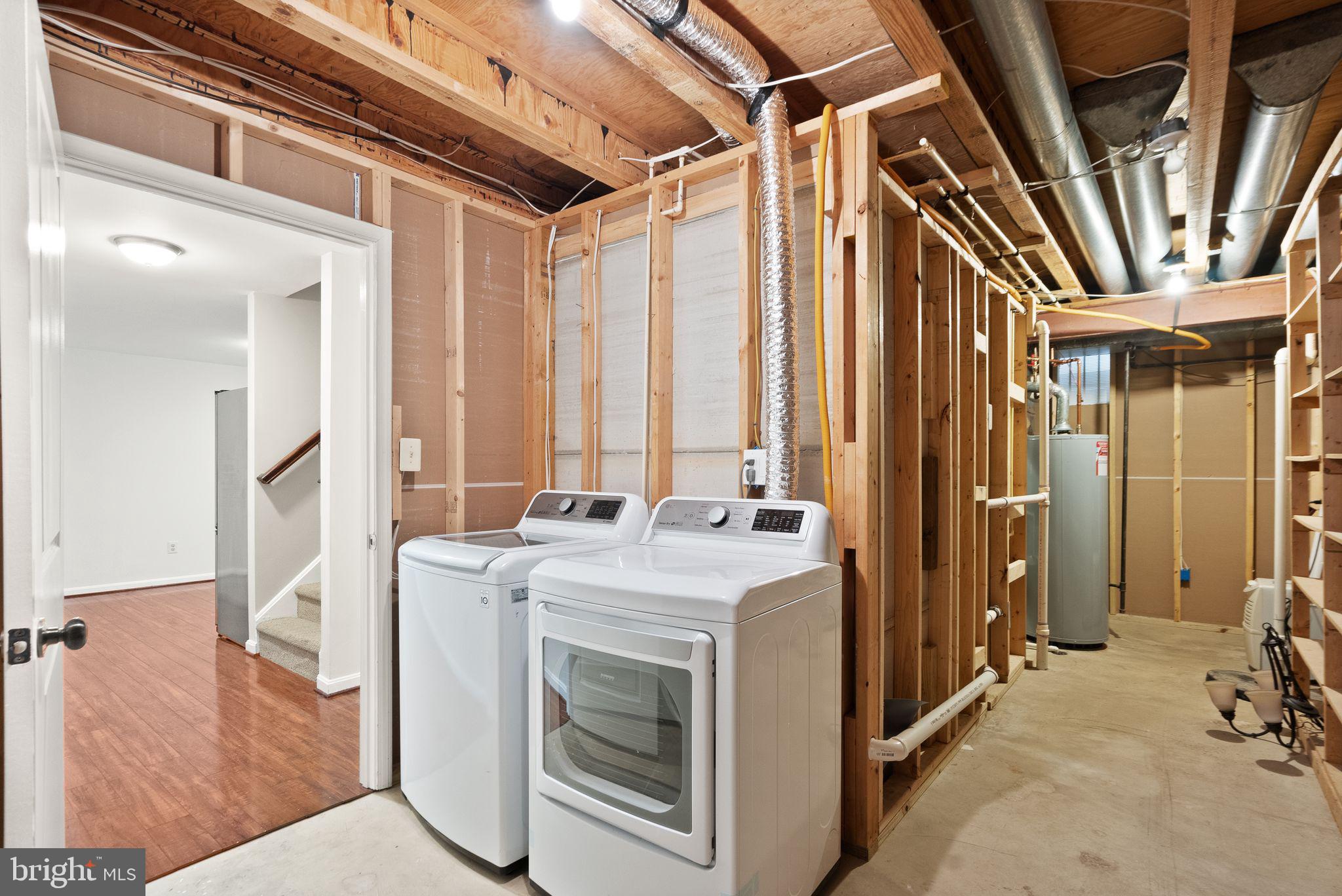 8144 Tall Timber Drive Gainesville, VA 20155 - Photo 54 of 73 a utility room with a washer and dryer