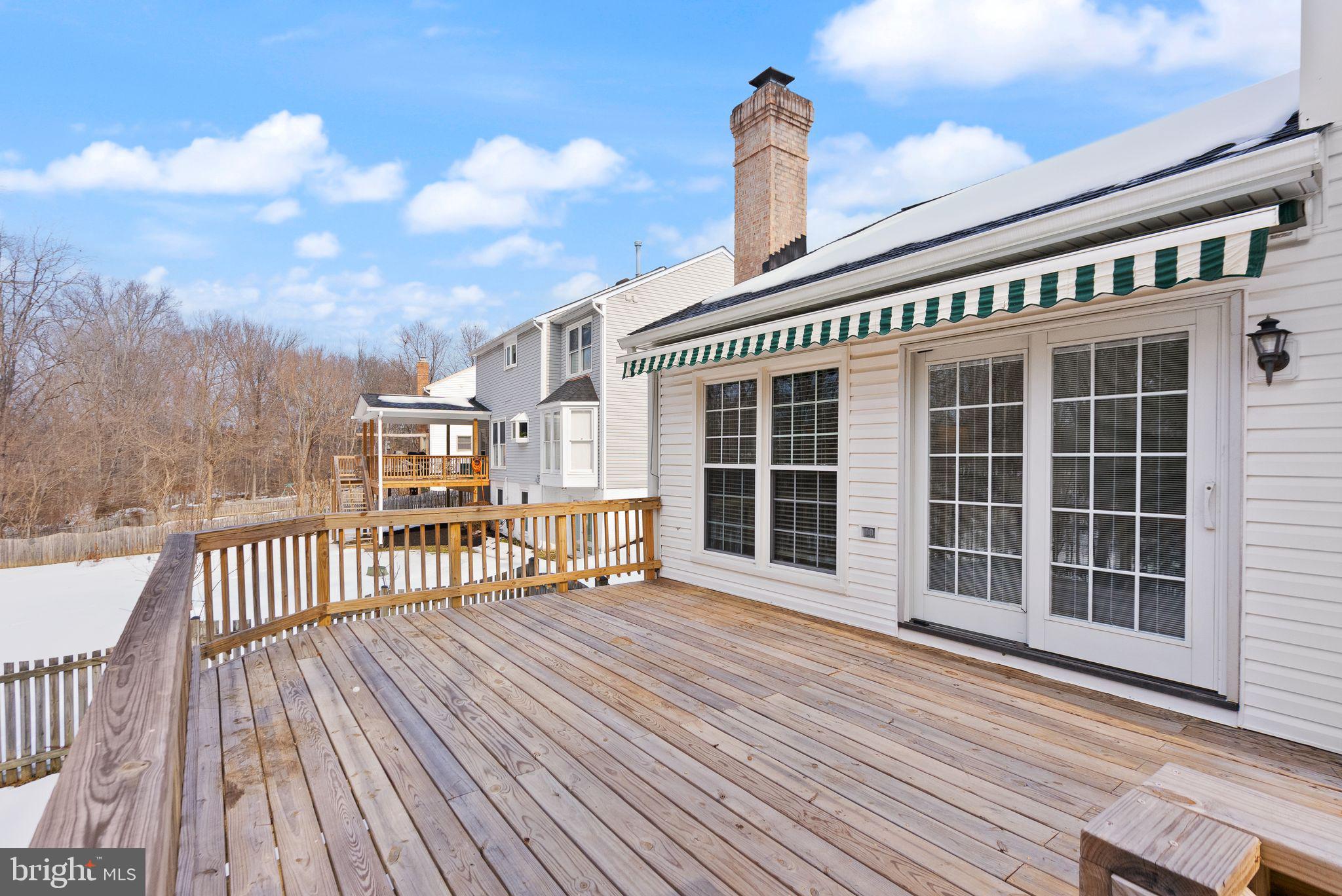 8144 Tall Timber Drive Gainesville, VA 20155 - Photo 58 of 73 a view of a house with a large window and wooden floor
