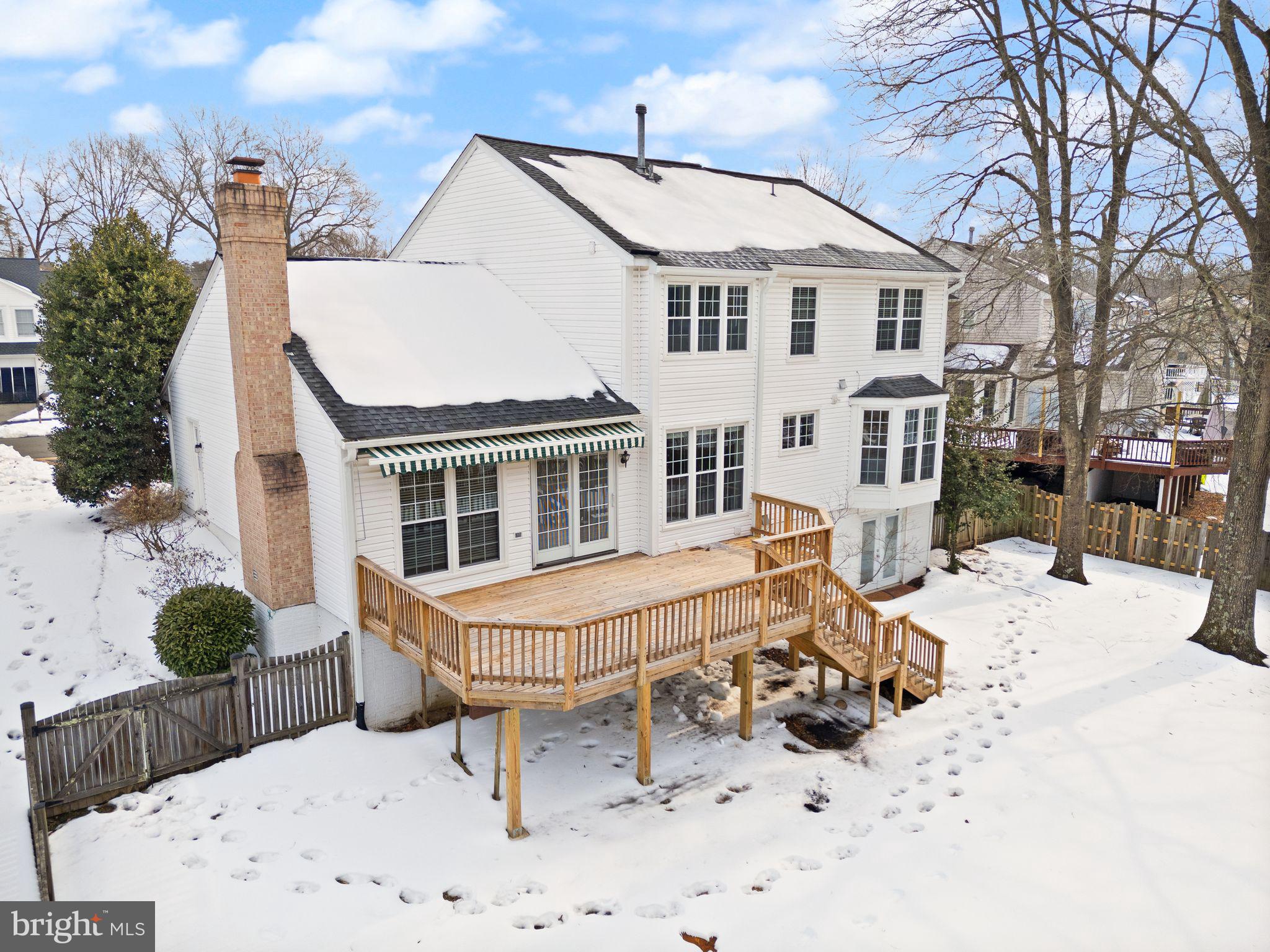 8144 Tall Timber Drive Gainesville, VA 20155 - Photo 61 of 73 a view of a white house with a bath tub