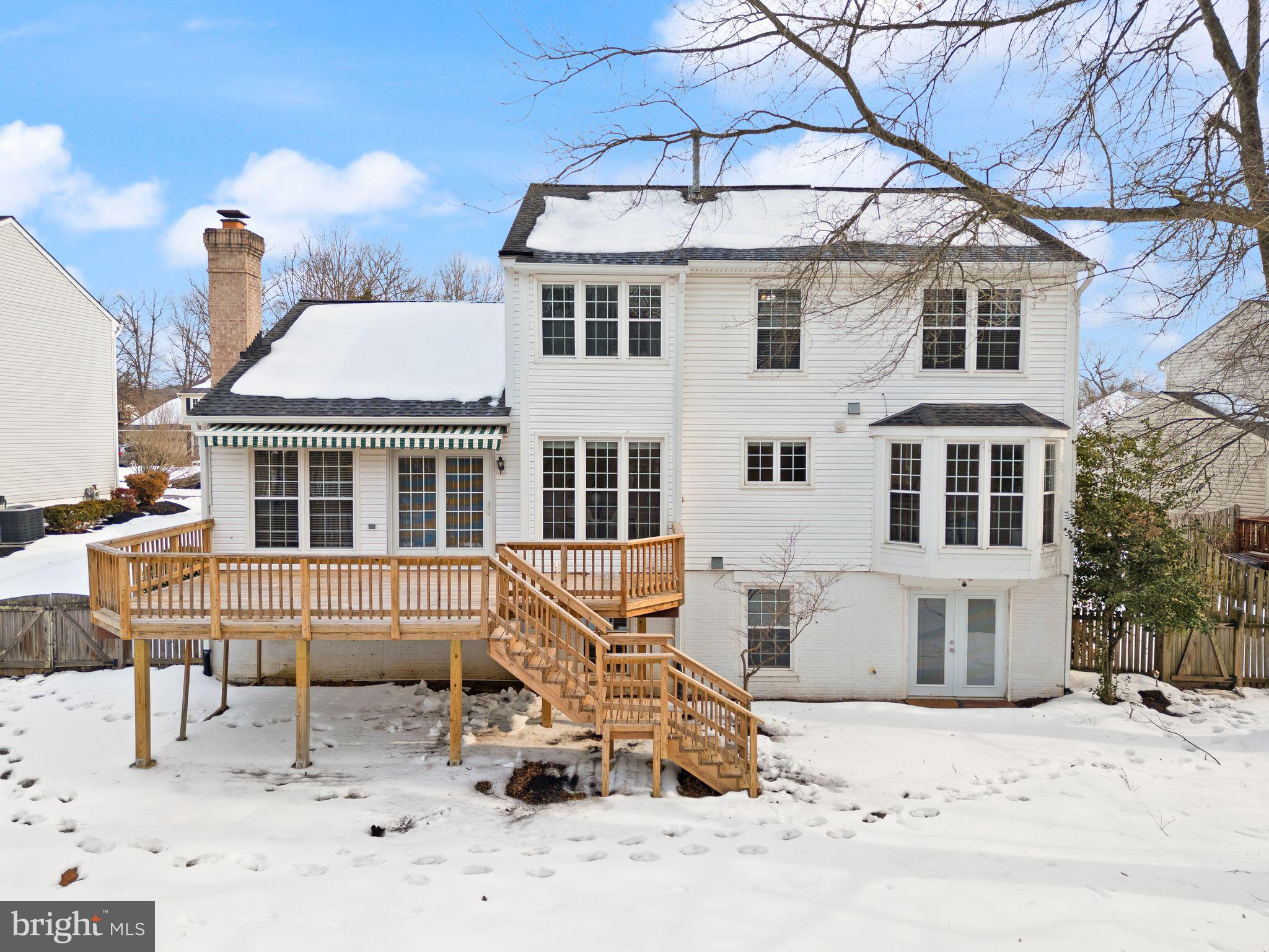 8144 Tall Timber Drive Gainesville, VA 20155 - Photo 62 of 73 a view of a dinning table and chairs in the patio