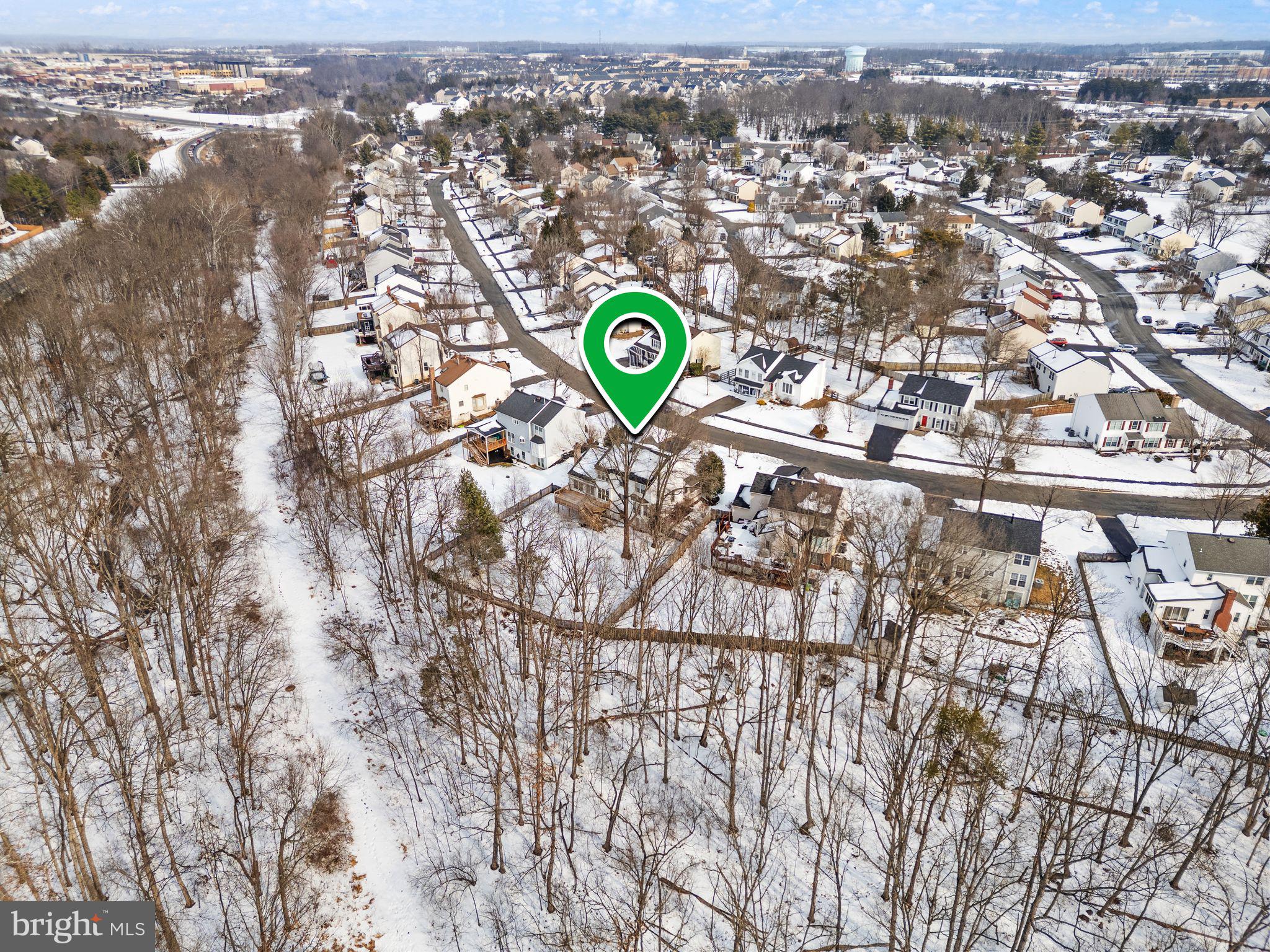 8144 Tall Timber Drive Gainesville, VA 20155 - Photo 69 of 73 an aerial view of a city with lots of residential buildings