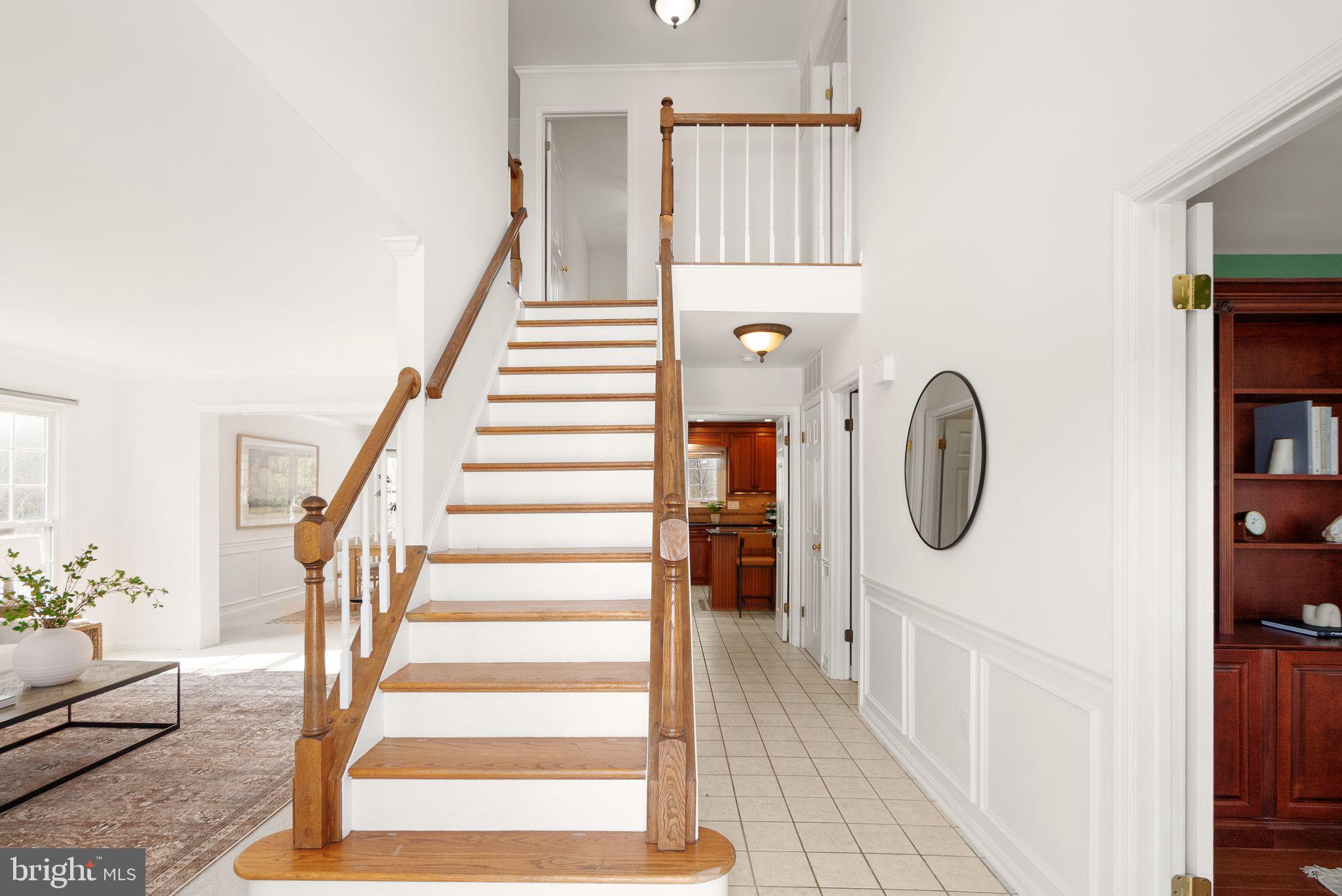 8144 Tall Timber Drive Gainesville, VA 20155 - Photo 10 of 73 a view of entryway with wooden floor