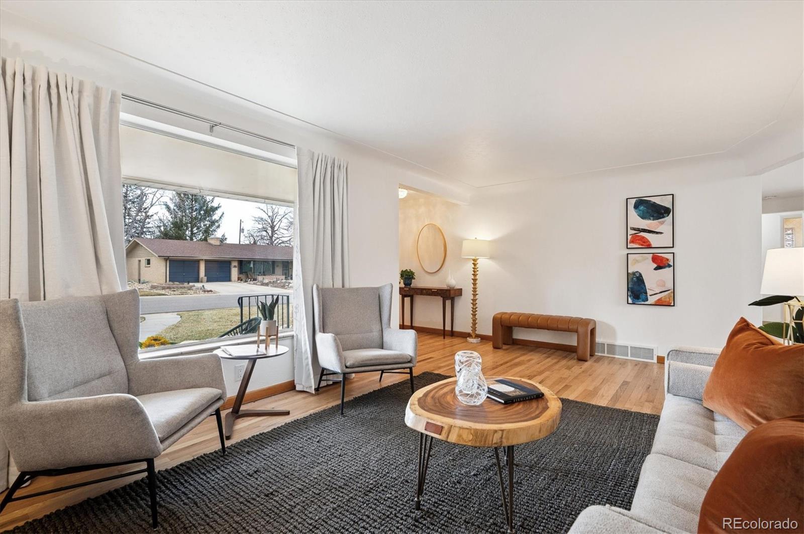 3880 Balsam Street Wheat Ridge, CO 80033 - Photo 15 of 40 a living room with furniture and a window