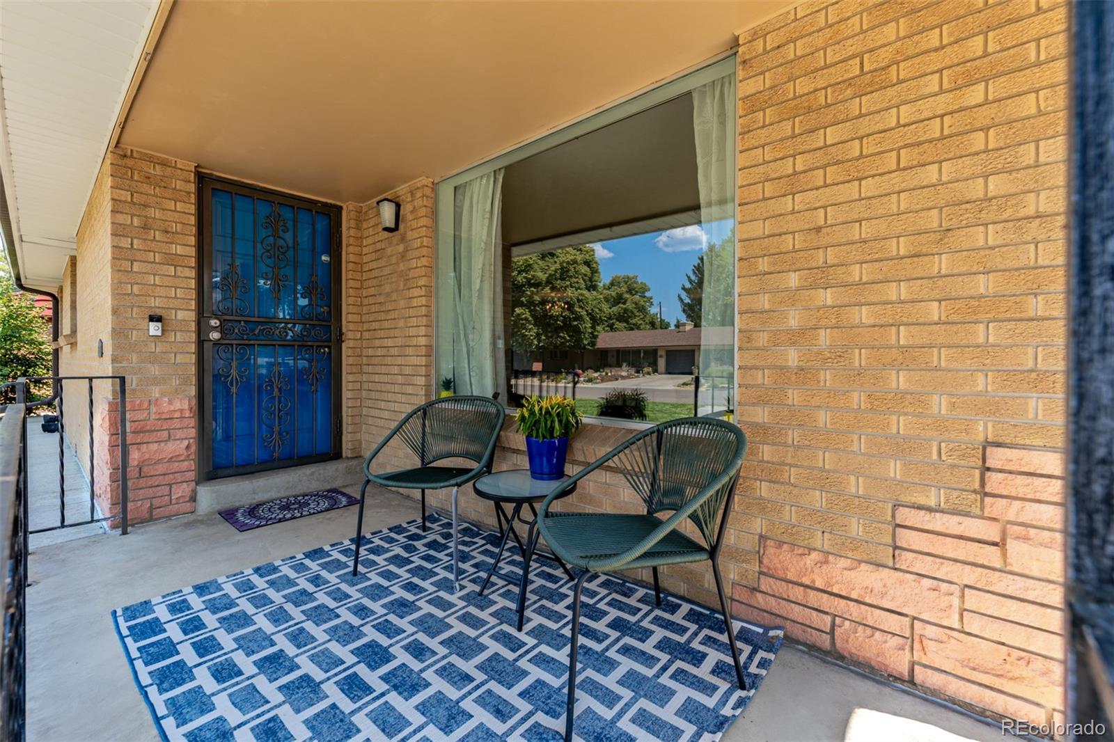 3880 Balsam Street Wheat Ridge, CO 80033 - Photo 2 of 40 a outdoor living space with furniture
