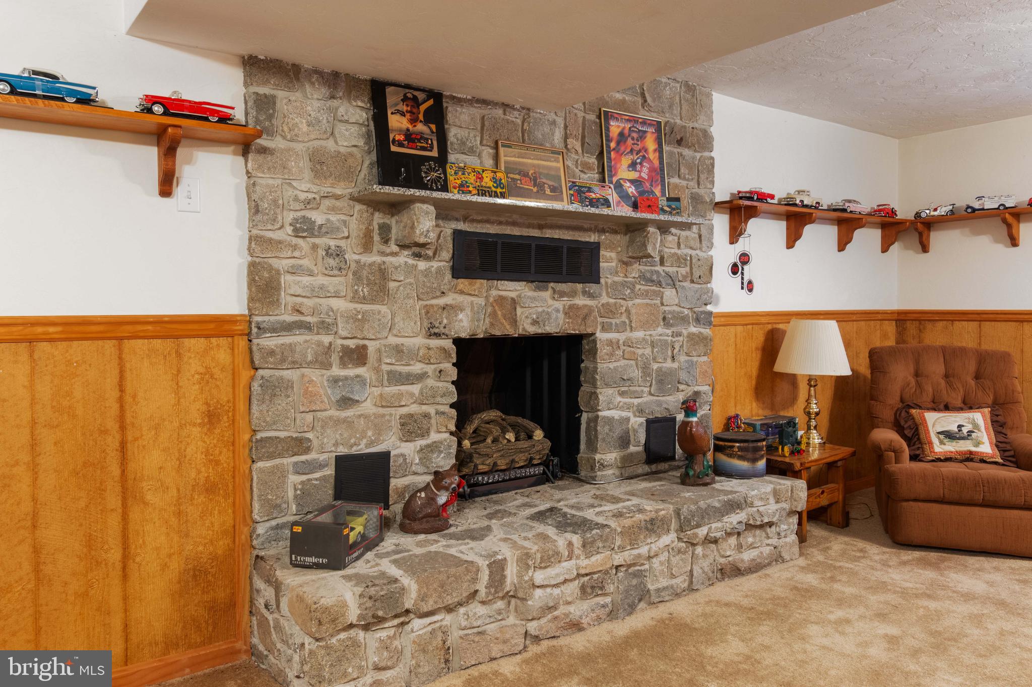 1424 Fish And Game Road Littlestown, PA 17340 - Photo 21 of 32 Stone FP in lower level rec room