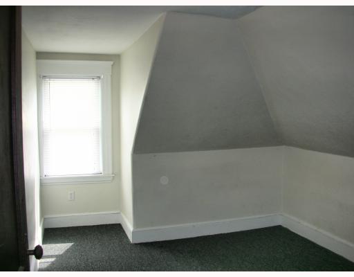 223 Front Street Woonsocket, RI 02895 - Photo 8 of 12 Bedroom. new carpety and new windows