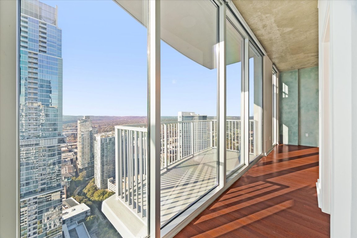360 Nueces Street, Unit 4008 Austin, TX 78701 - Photo 16 of 40 a view of balcony with wooden floor