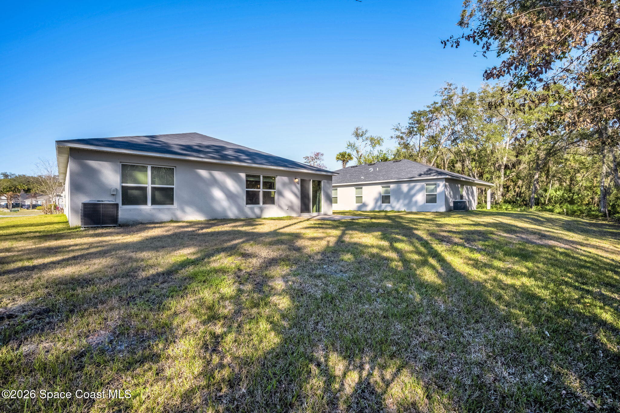 1219 Moscato Drive Titusville, FL 32780 - Photo 19 of 21 a view of a house with a yard