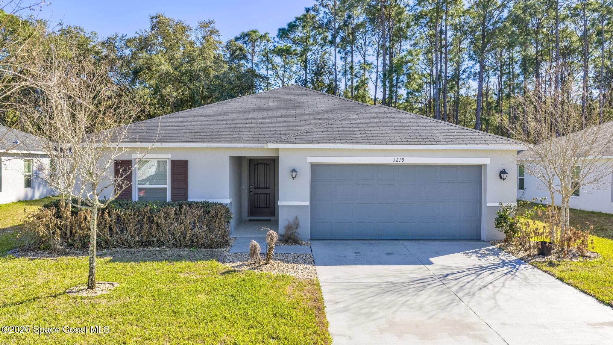 1219 Moscato Drive Titusville, FL 32780 - Photo 2 of 21 a view of a house with backyard