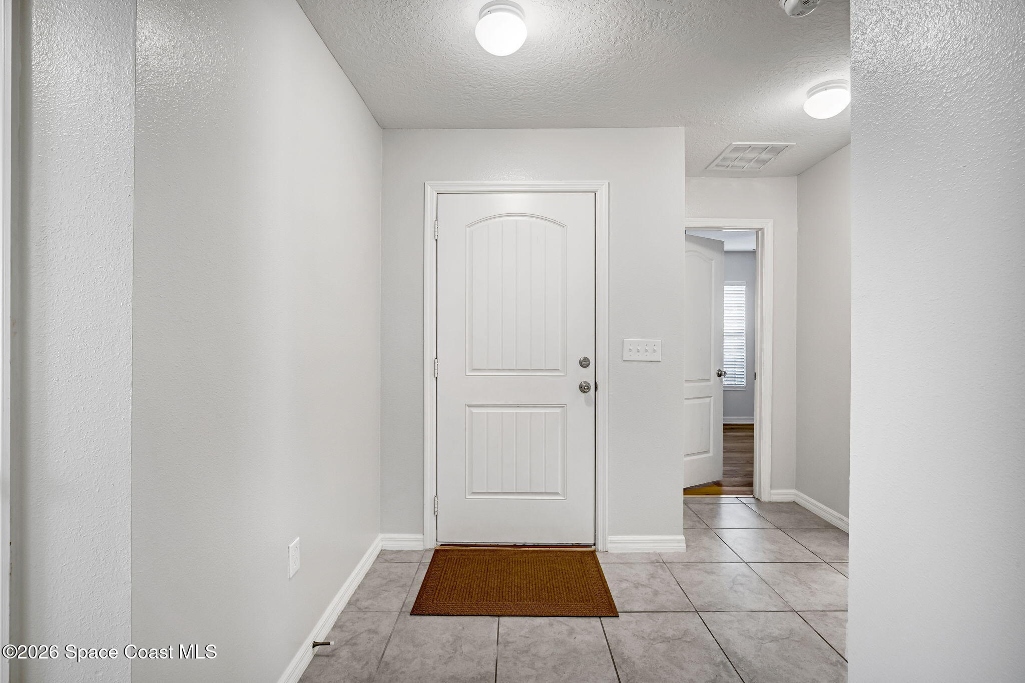 1219 Moscato Drive Titusville, FL 32780 - Photo 3 of 21 a view of an empty room and window