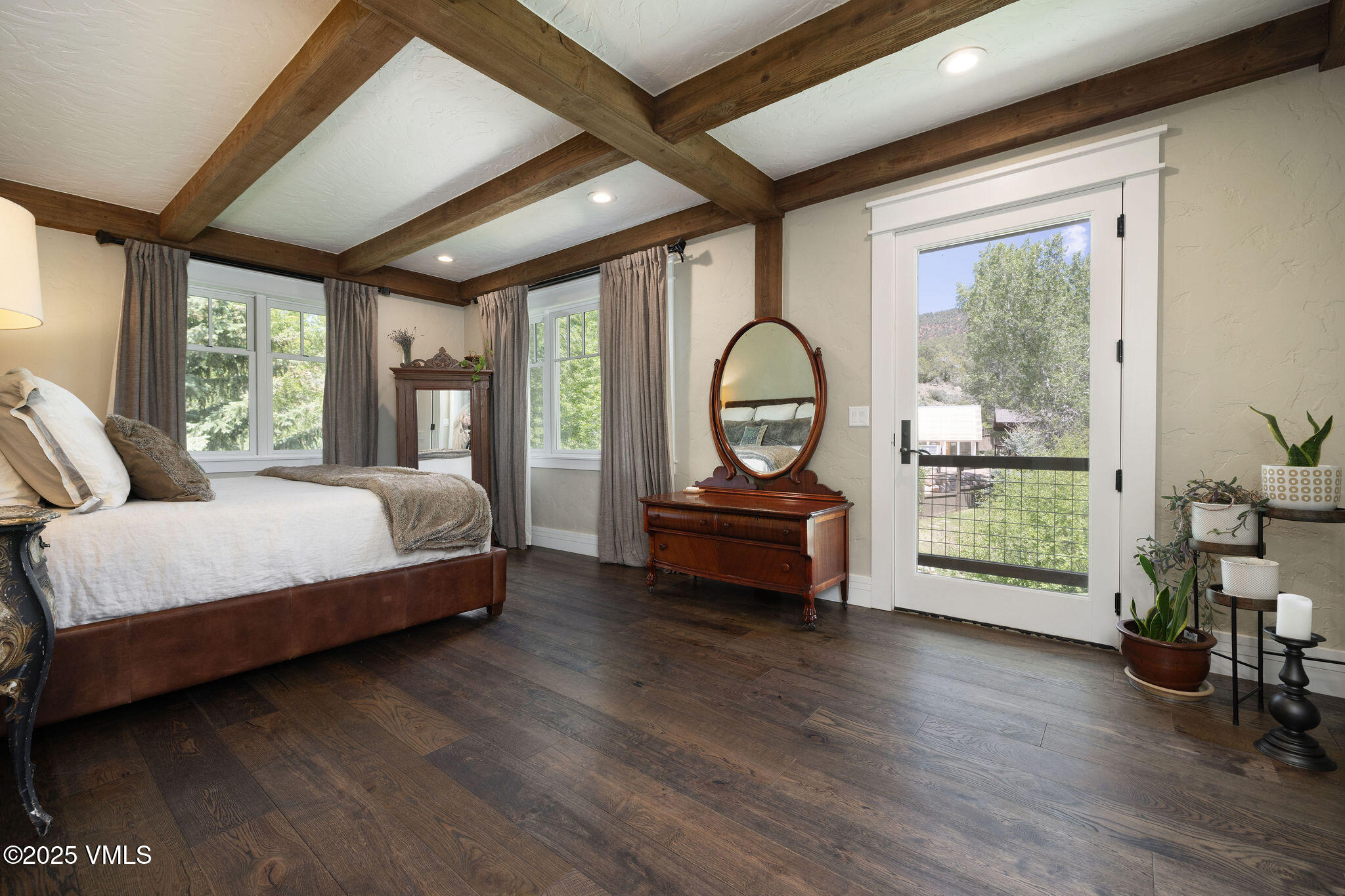 1794 Eby Creek Road Eagle, CO 81631 - Photo 11 of 45 a bedroom with furniture and a window