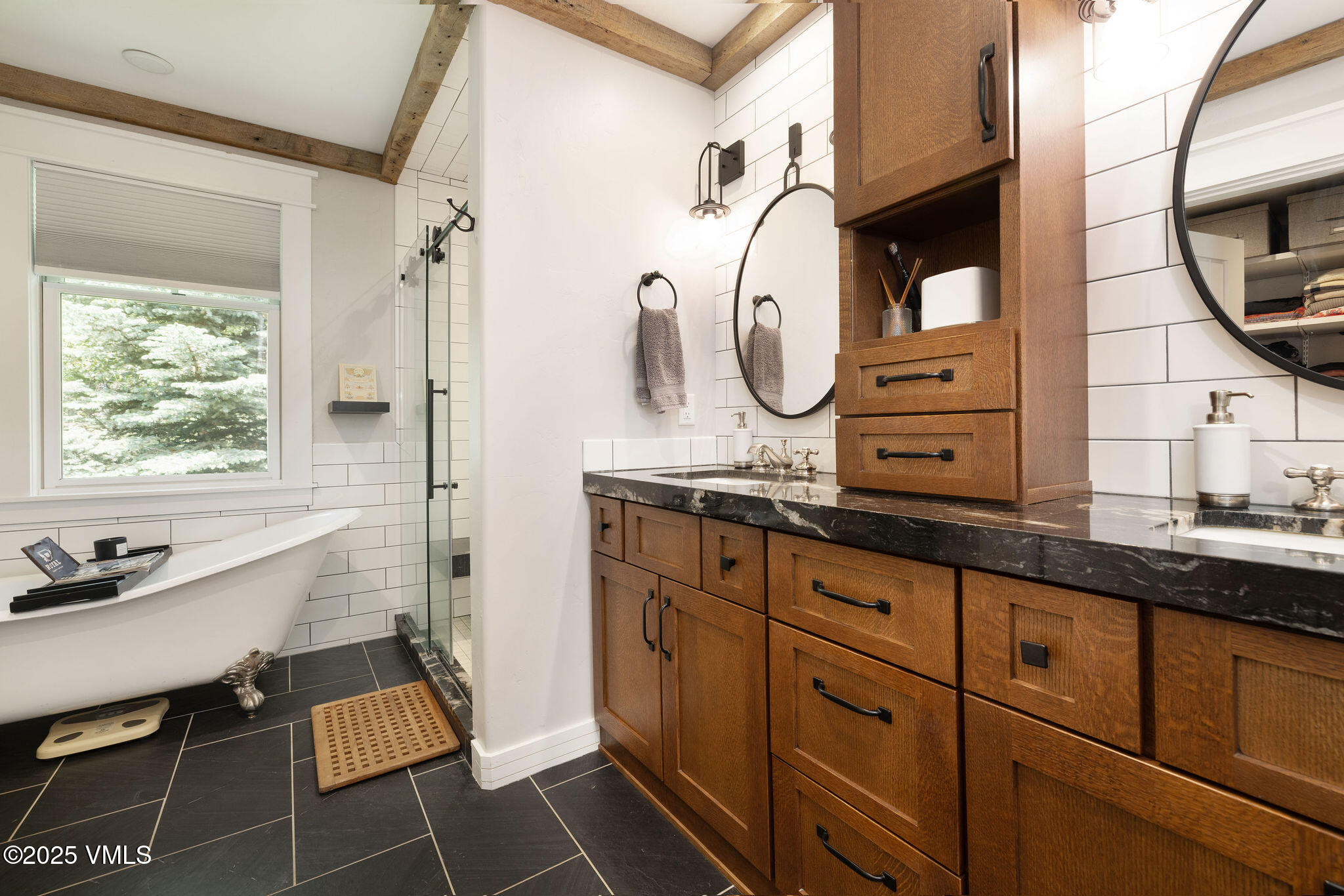 1794 Eby Creek Road Eagle, CO 81631 - Photo 13 of 45 a spacious bathroom with a granite countertop sink mirror and vanity